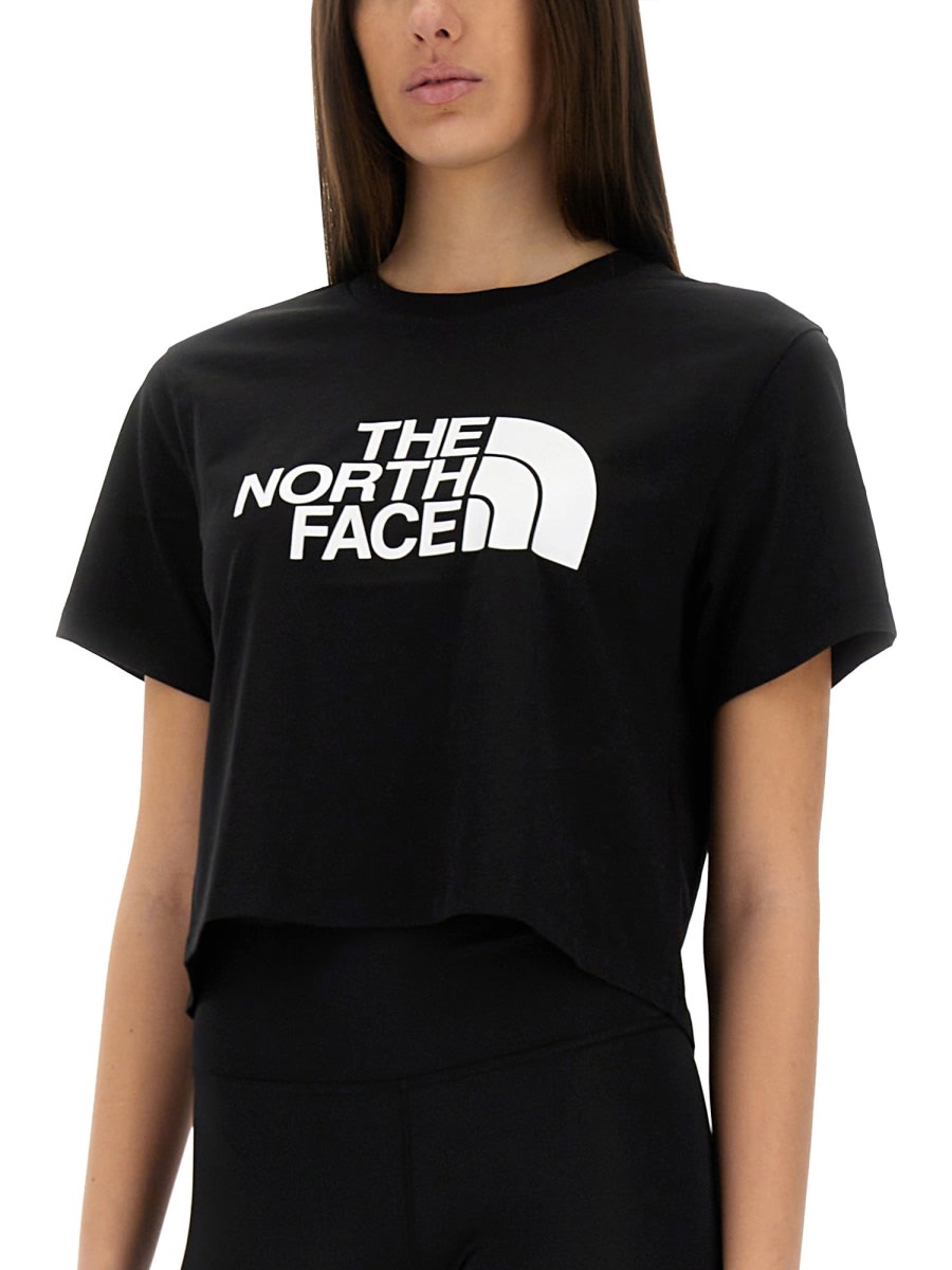Shop The North Face Easy Short Waist T-shirt In Black