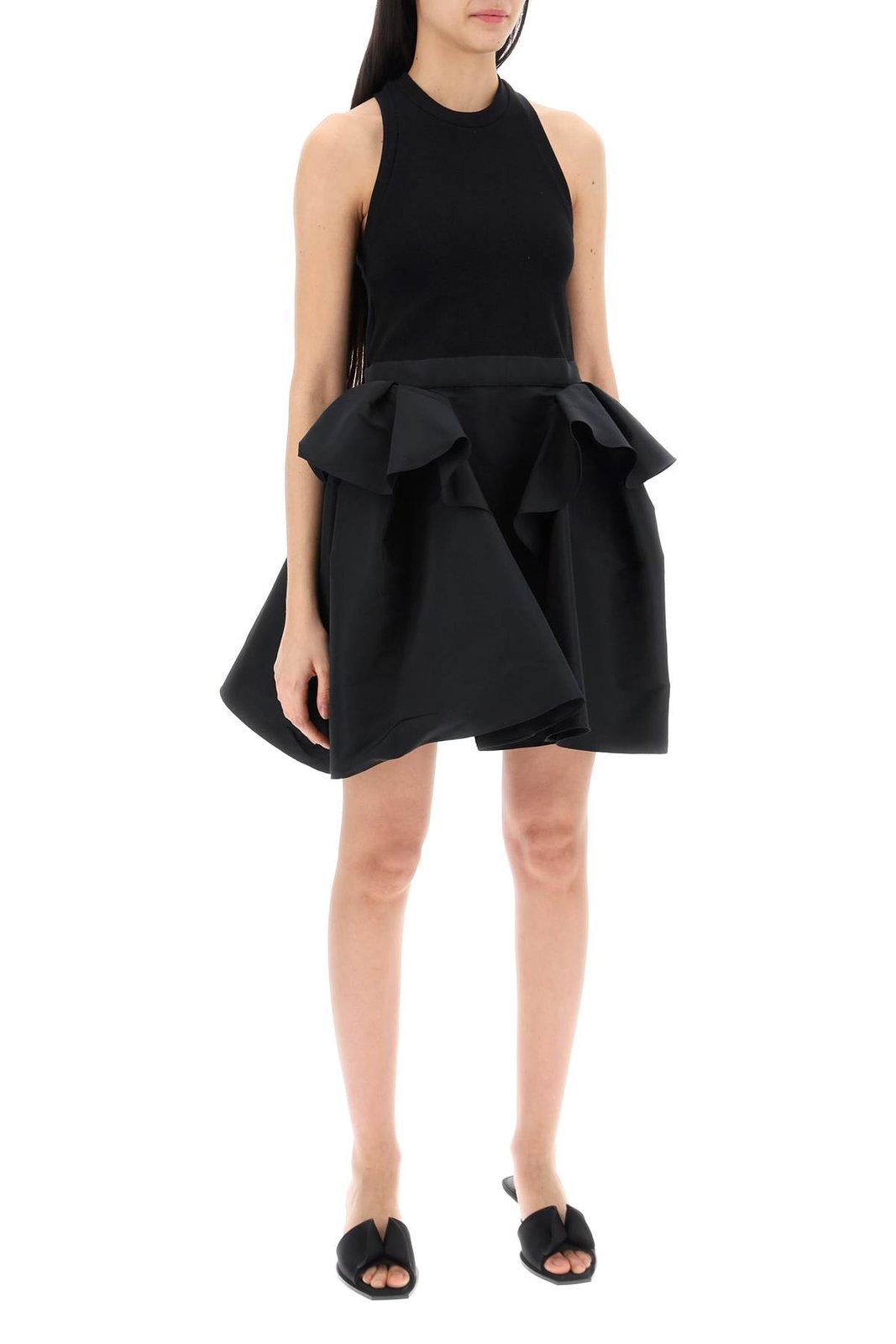 Shop Alexander Mcqueen Panelled Peplum Sleeveless Mini Dress In Black