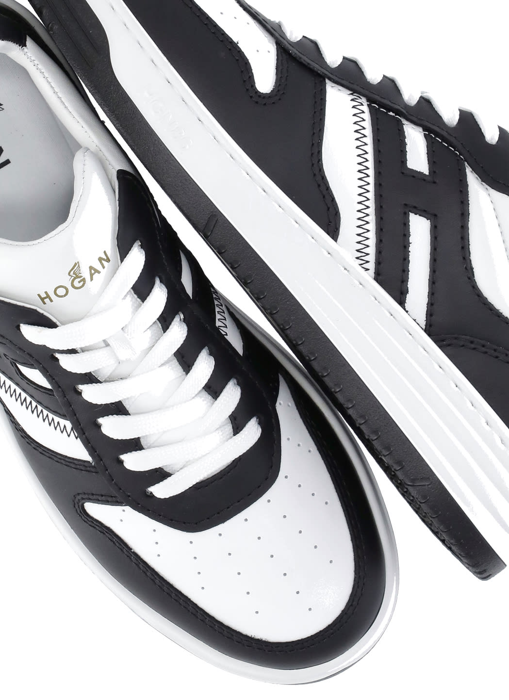 Hogan H630 Sneakers With Rubber Sole And Perforated Detailing In White/black