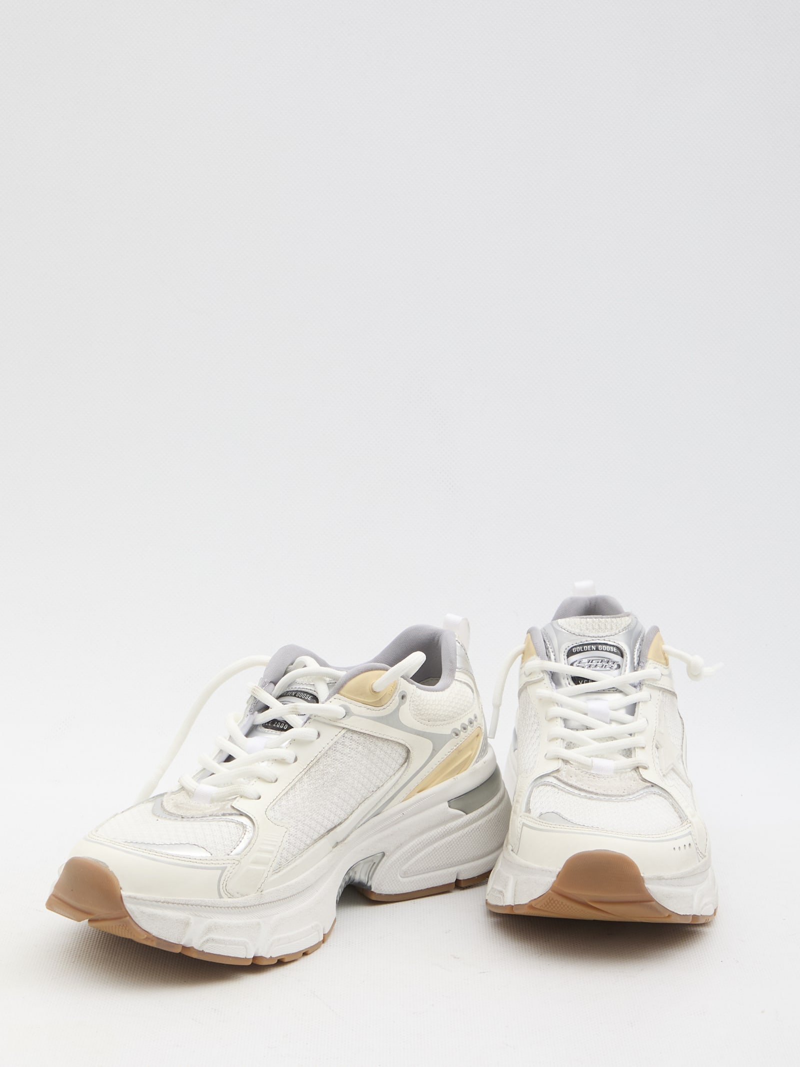 Shop Golden Goose Lightstar Sneakers In White