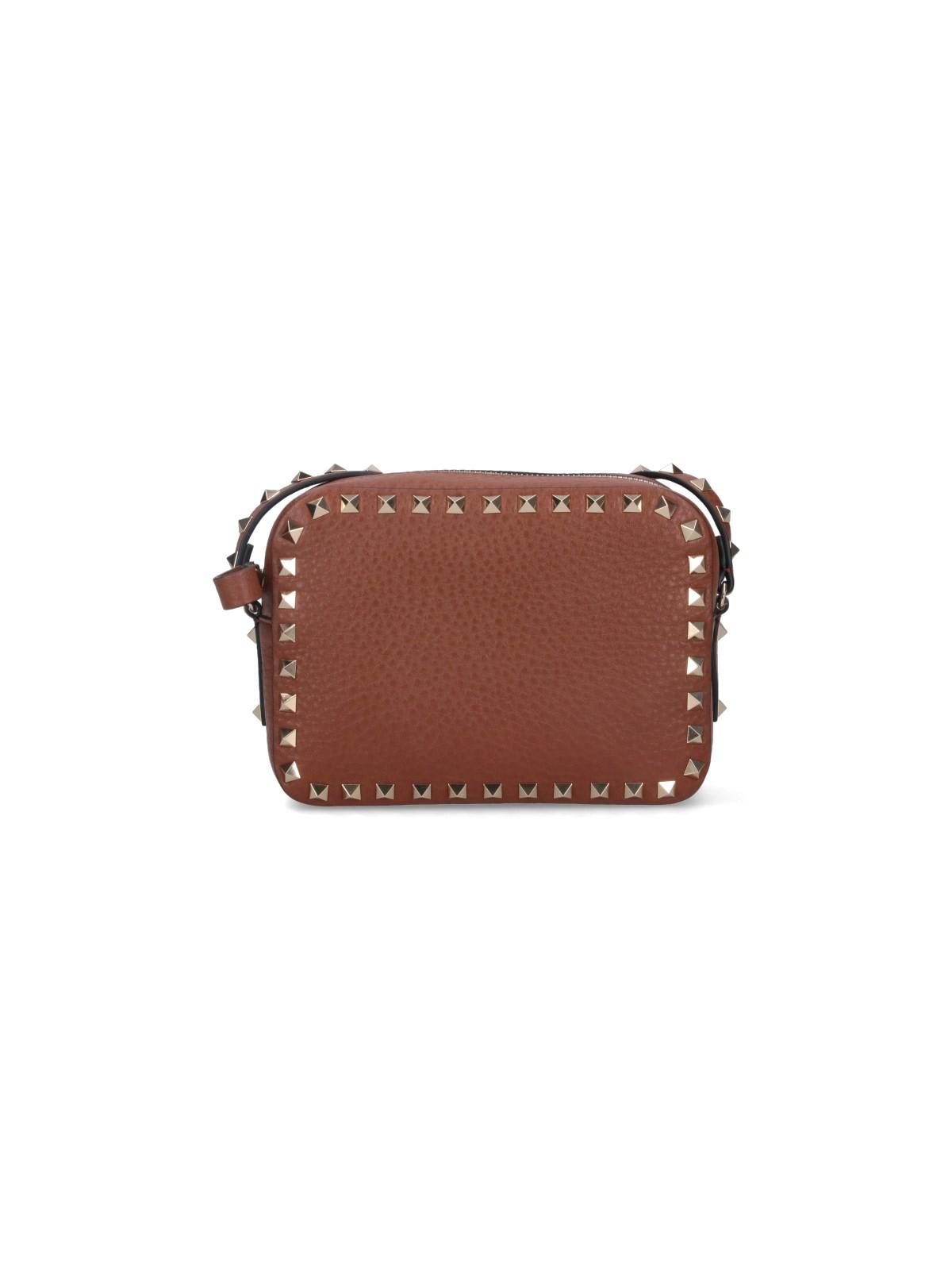 Shop Valentino Rockstud Mini Bag In Brown