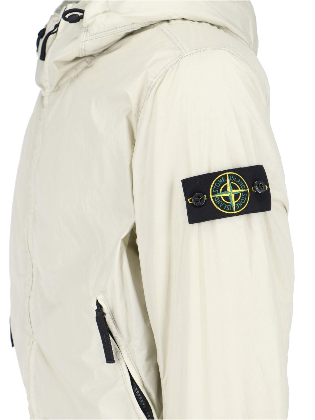 Shop Stone Island Logo Patched Rib Hem Zipped Windbreaker In Plaster