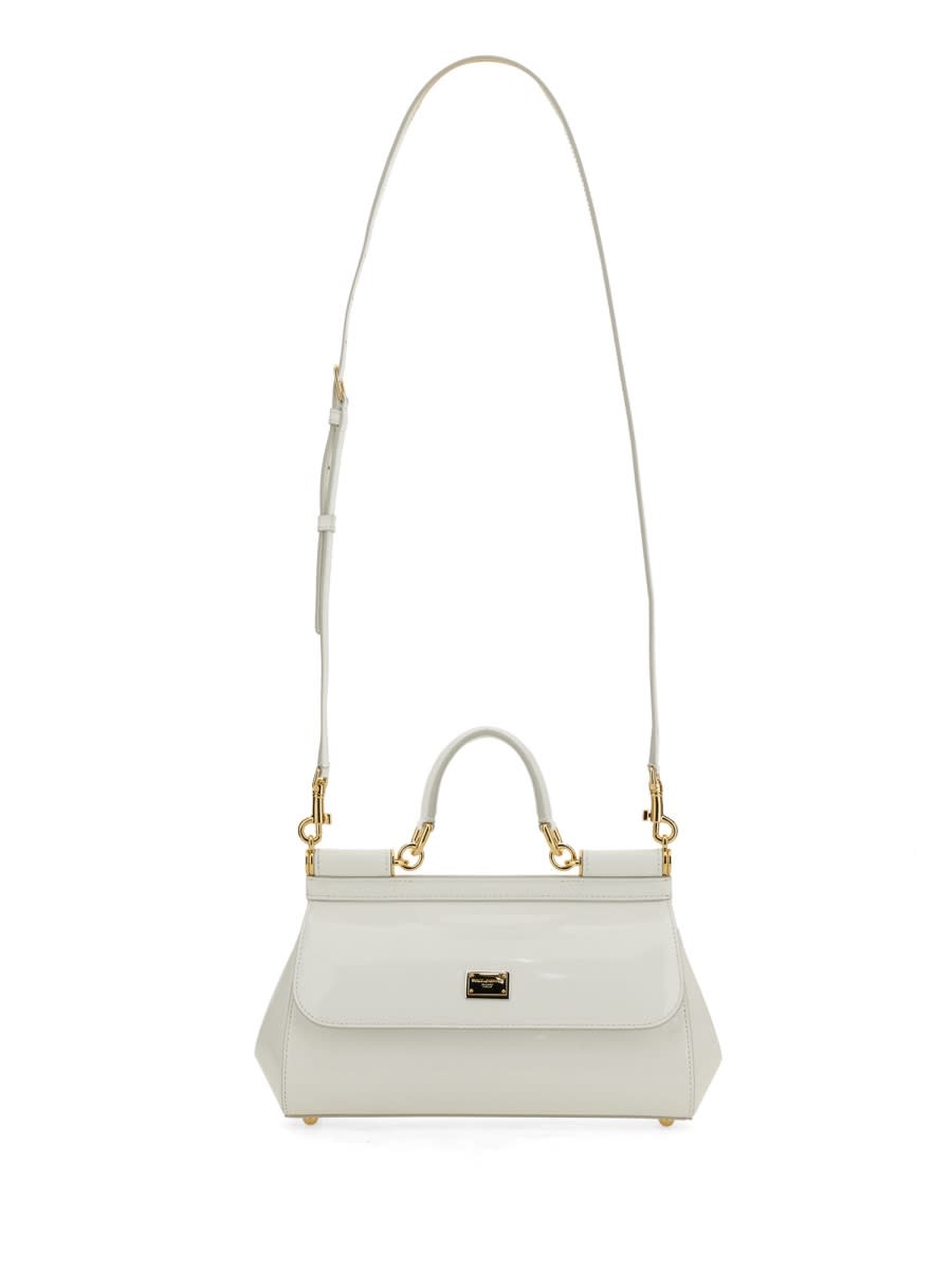 Shop Dolce & Gabbana Elongated Sicily Handbag In White