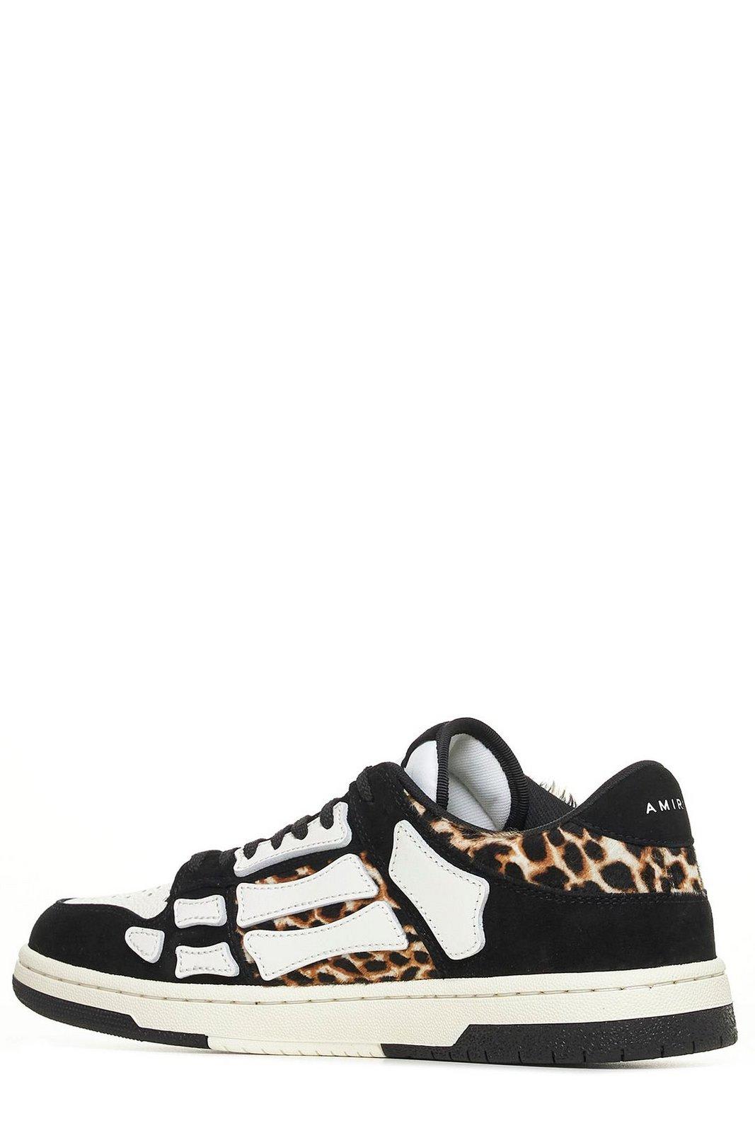 Shop Amiri Skeleton Patch Round Toe Sneakers In Black/white