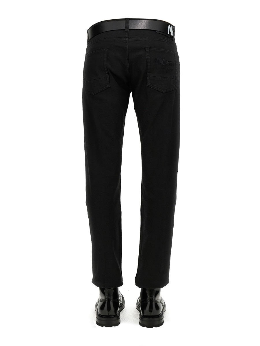 Shop Alexander Mcqueen Jeans With Logo Embroidery In Black