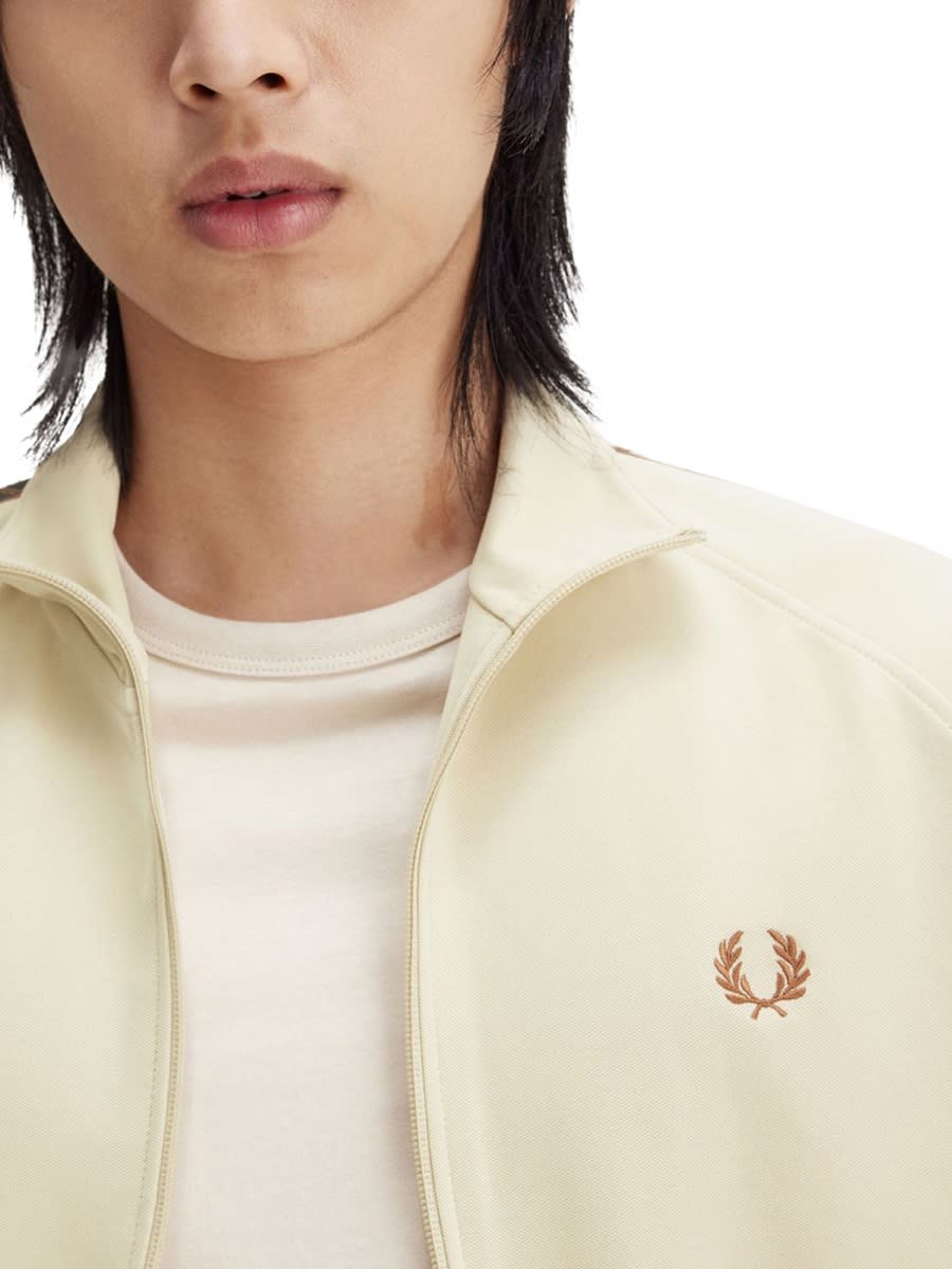 Shop Fred Perry Zip Sweatshirt. In Beige