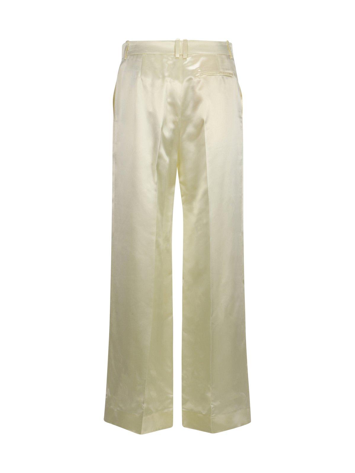 Shop The Row Pleated Encore Pants In Milk