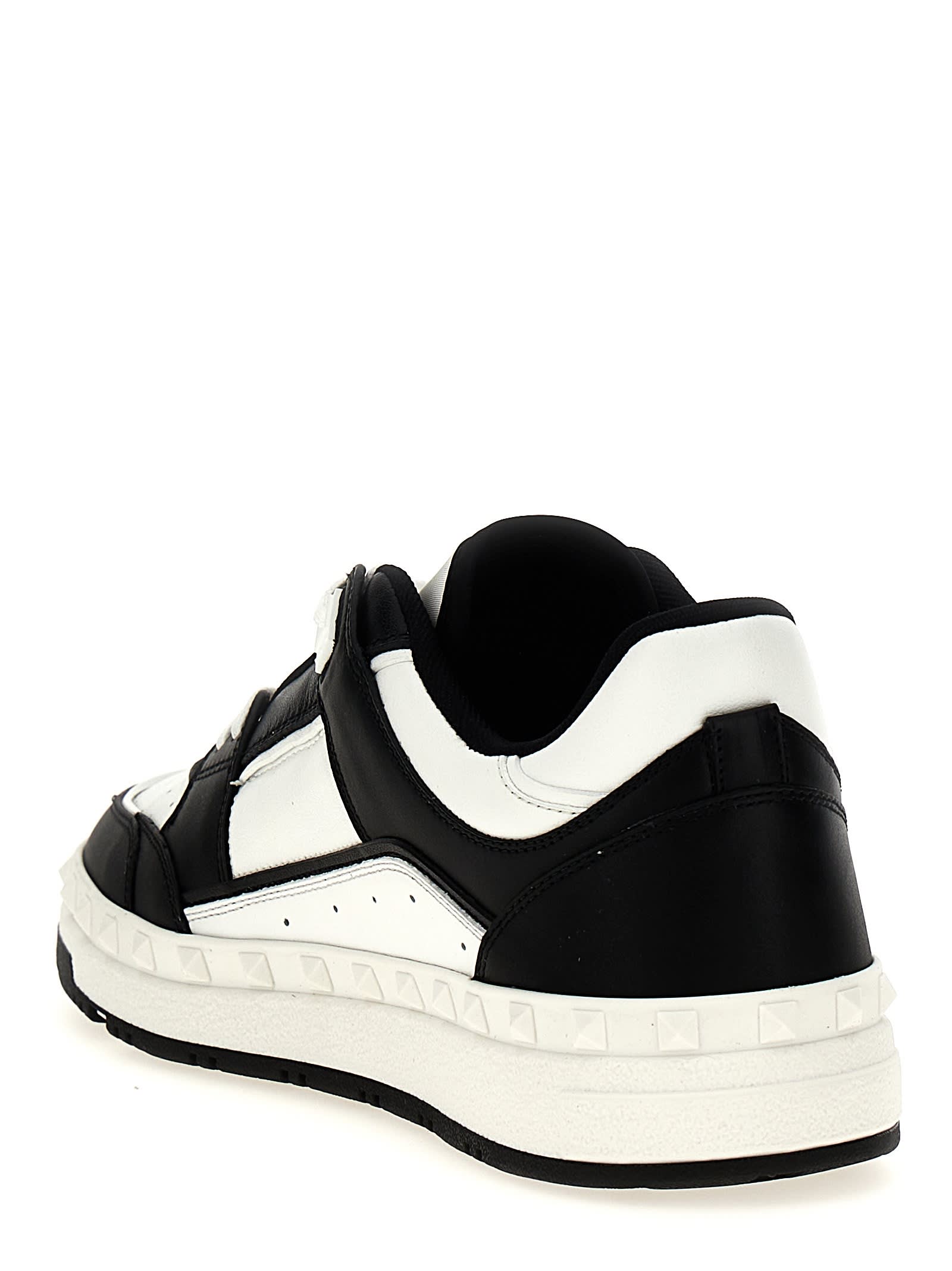 Shop Valentino Garavani Freedots Sneakers In White/black