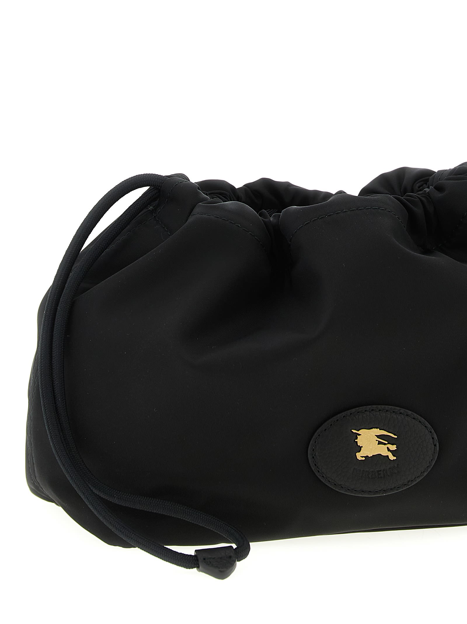 Burberry Reversible Leather-trimmed Shell Pouch In Black