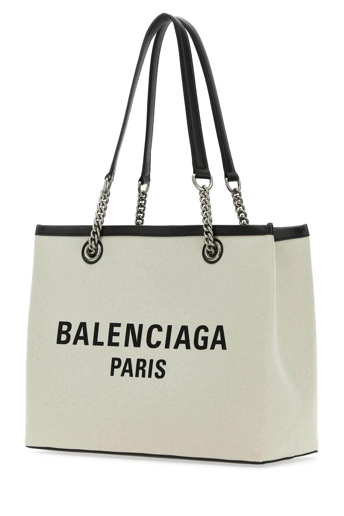 Shop Balenciaga Ivory Canvas M Duty Free Shopping Bag In Beige