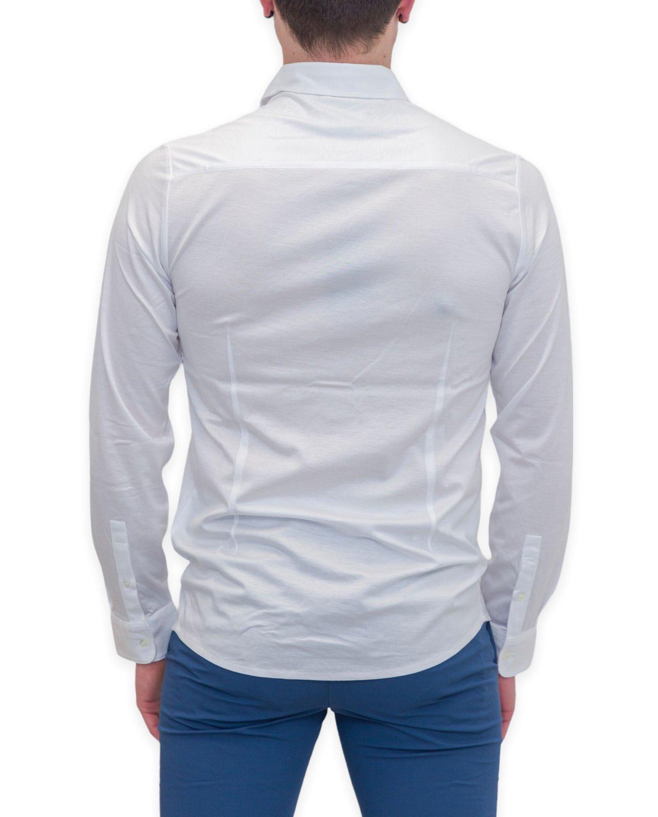 Shop Emporio Armani Curved Hem Buttoned Shirt In White