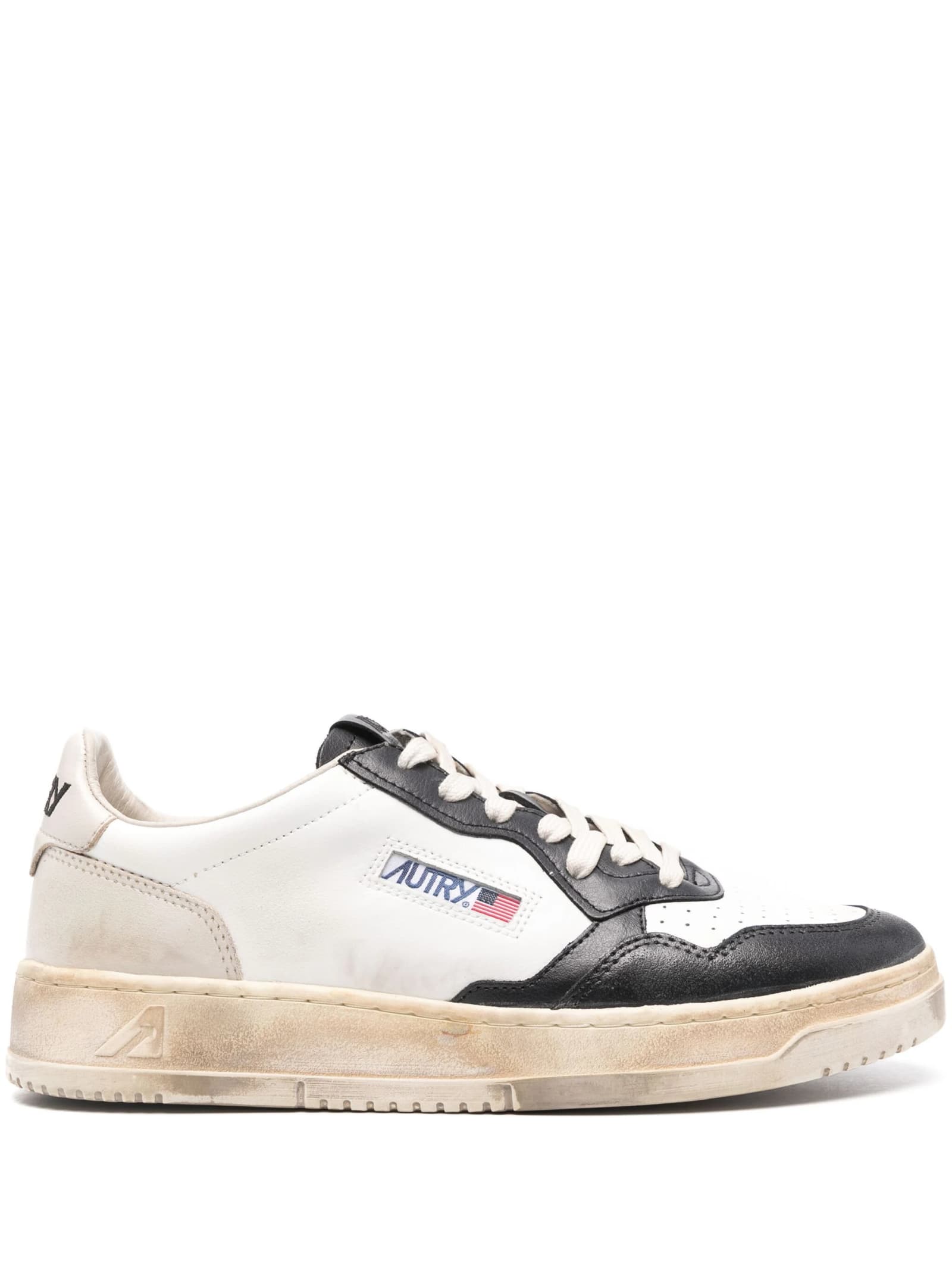 Shop Autry Super Vintage Medalist Low Sneakers In Black And White Leather