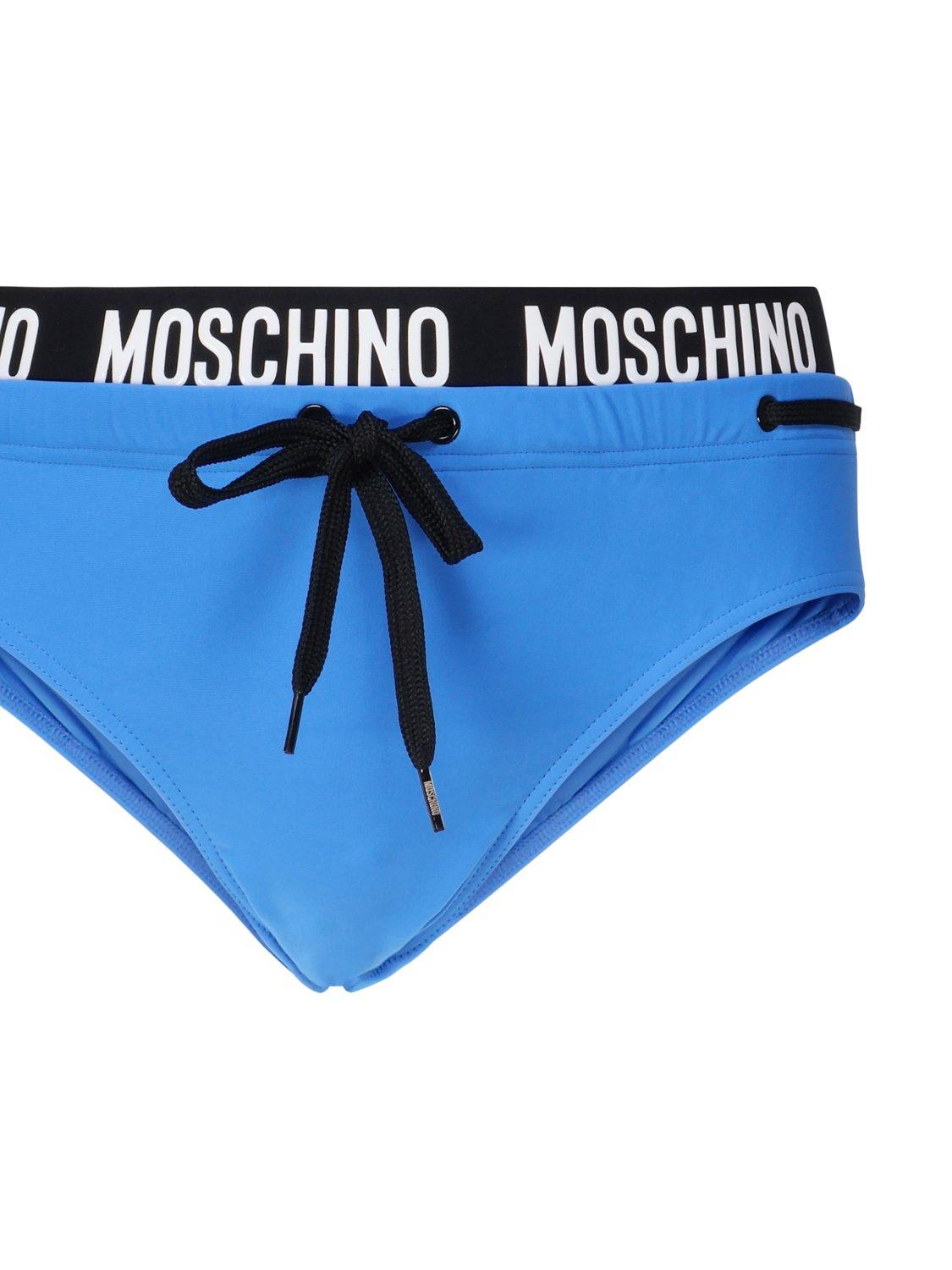 Shop Moschino Logo Waistband Drawstring Swim Briefs In Blue, Black