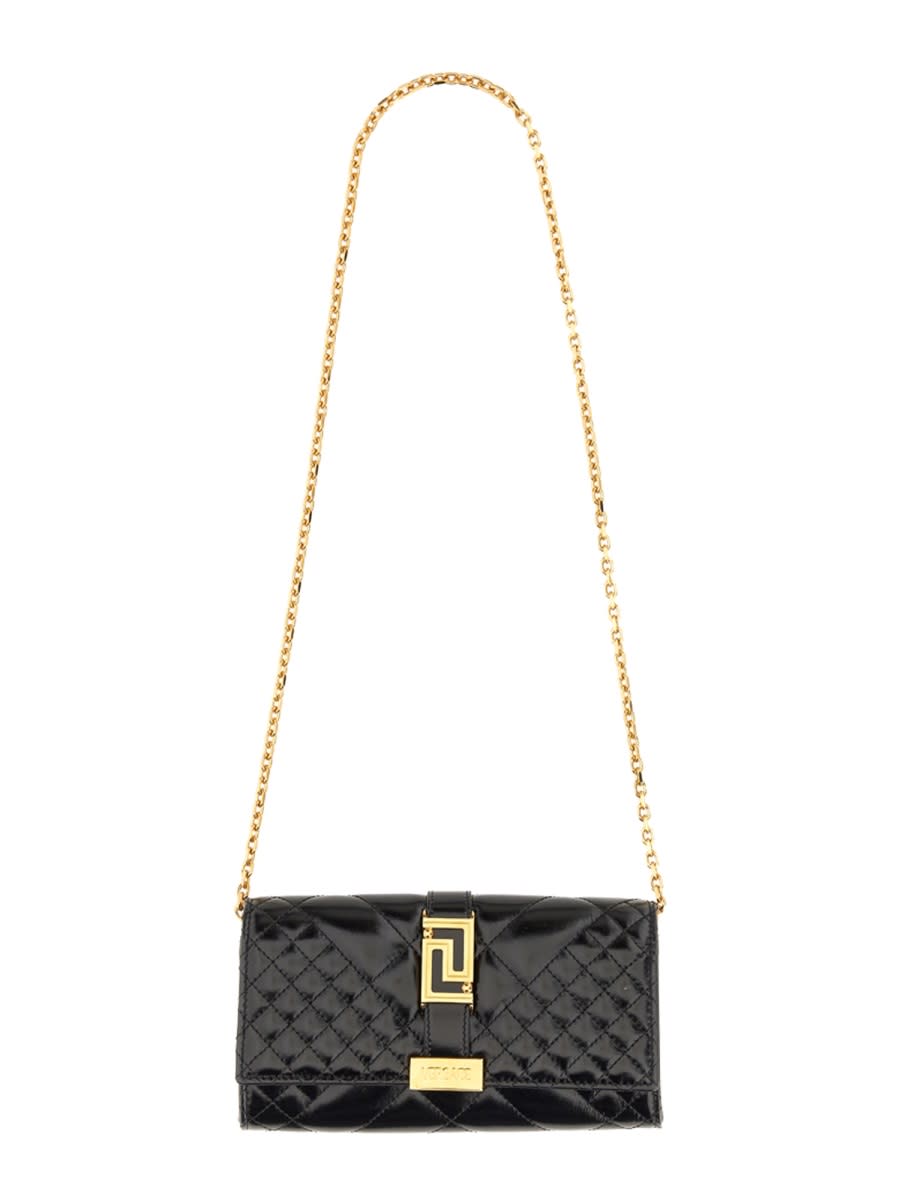 Shop Versace Greca Goddess Clutch Bag In Black