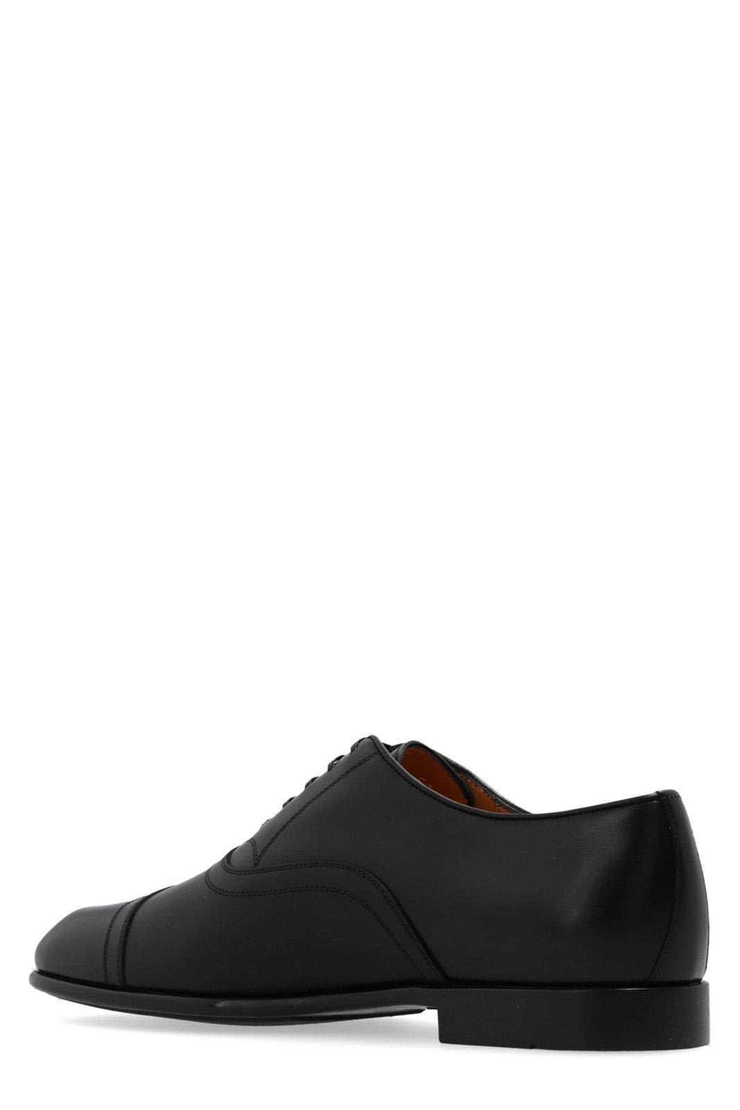 Ferragamo Toe Cap Oxford Shoes In Black