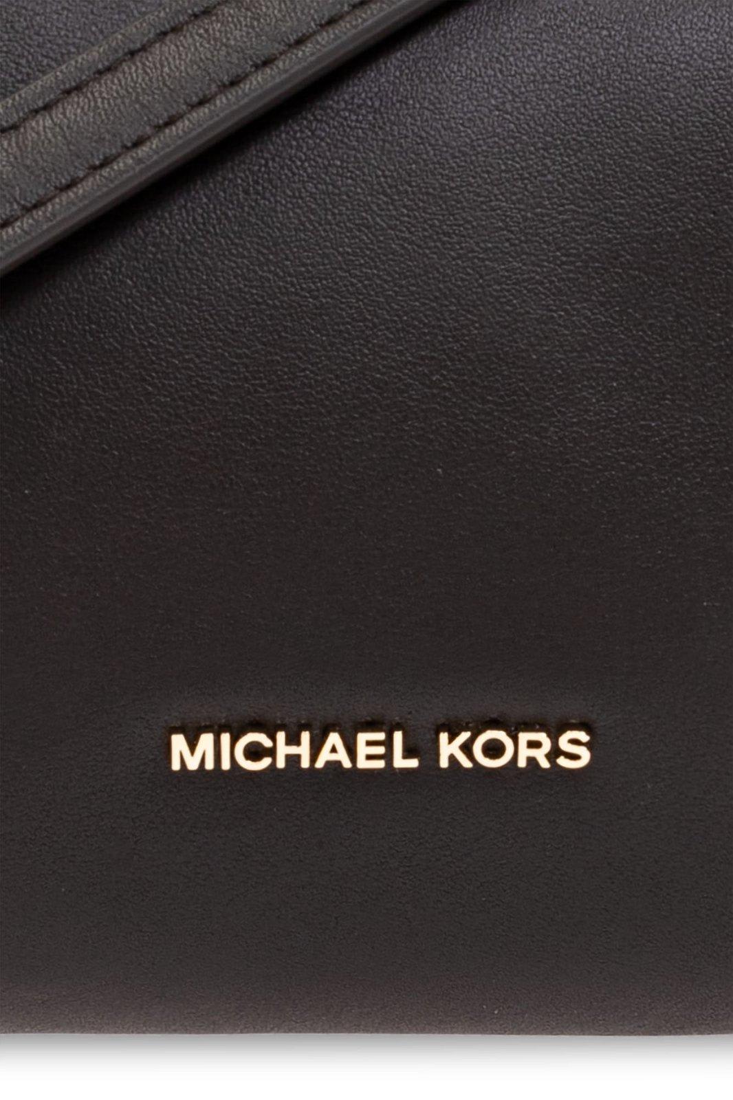 Shop Michael Kors Orchard Small Barrel Crossbody Bag In Brown