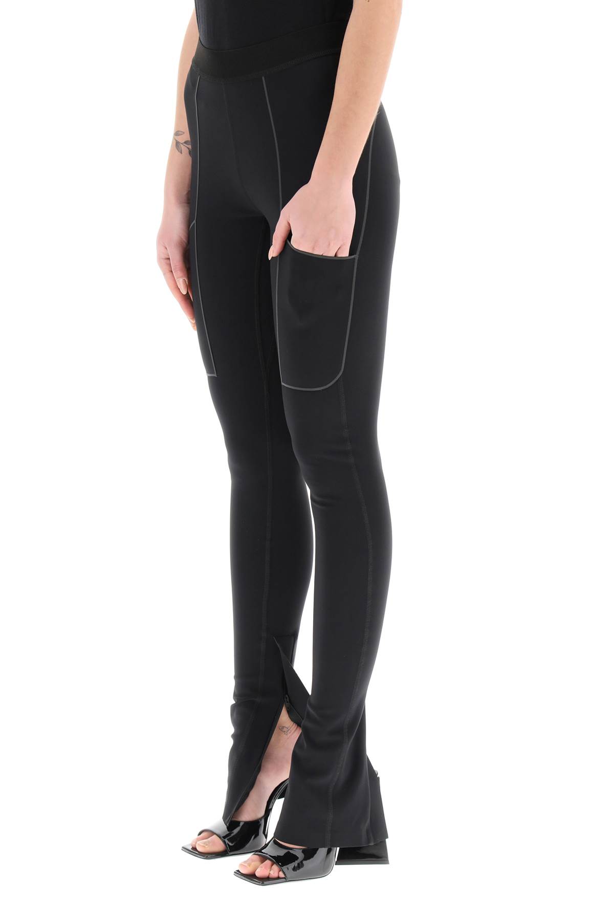 Shop Coperni Zippered Cuff Leggings In Black (black)