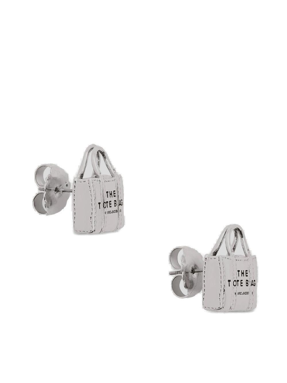 Shop Marc Jacobs Tote Bag Logo Engraved Stud Earrings In Silver