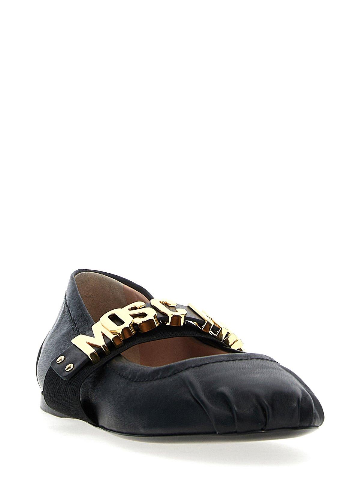 Shop Moschino Logo Lettering Ballet Flats In Black