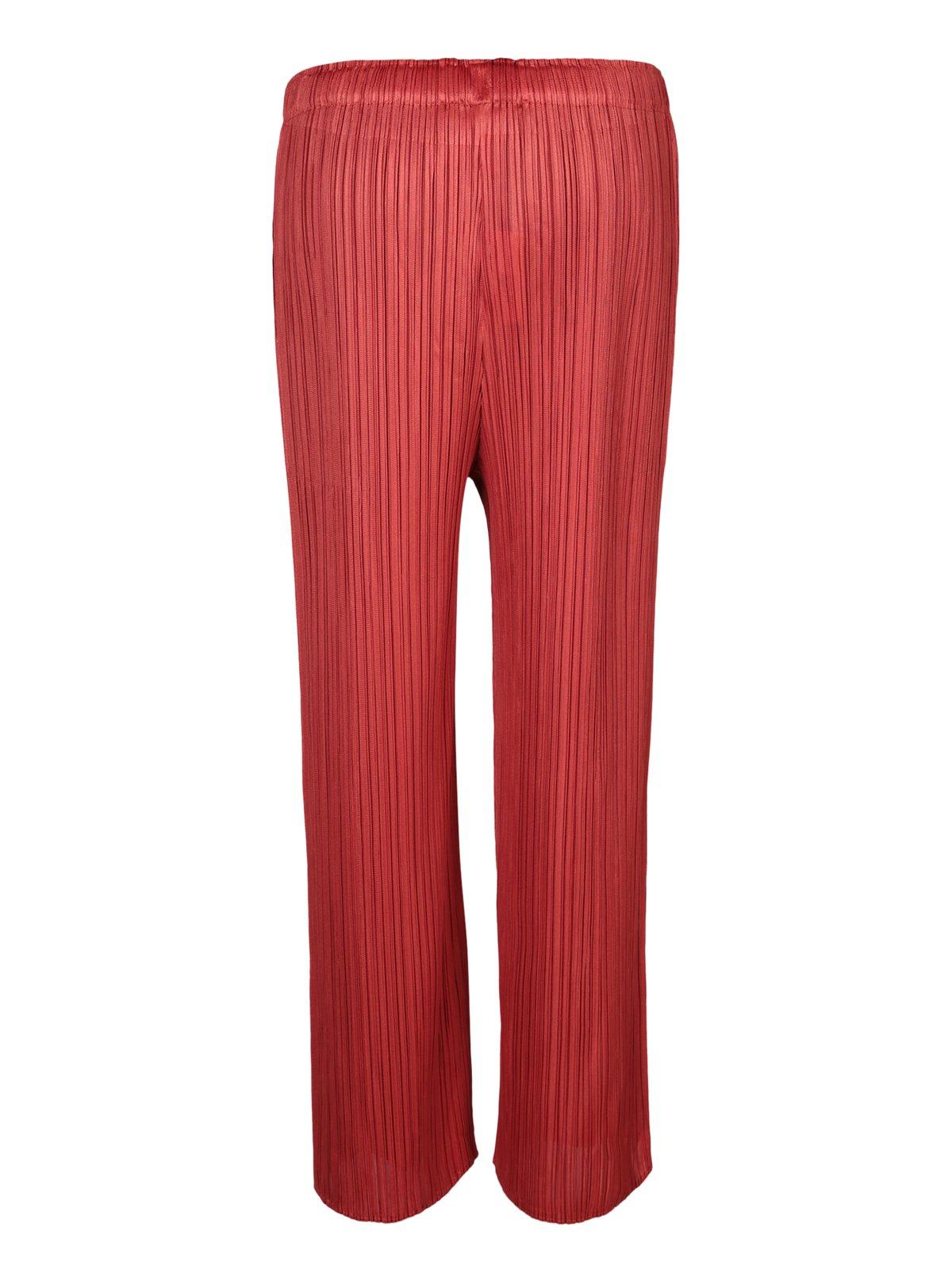 Shop Issey Miyake Pleated Straight Leg Pants In Red