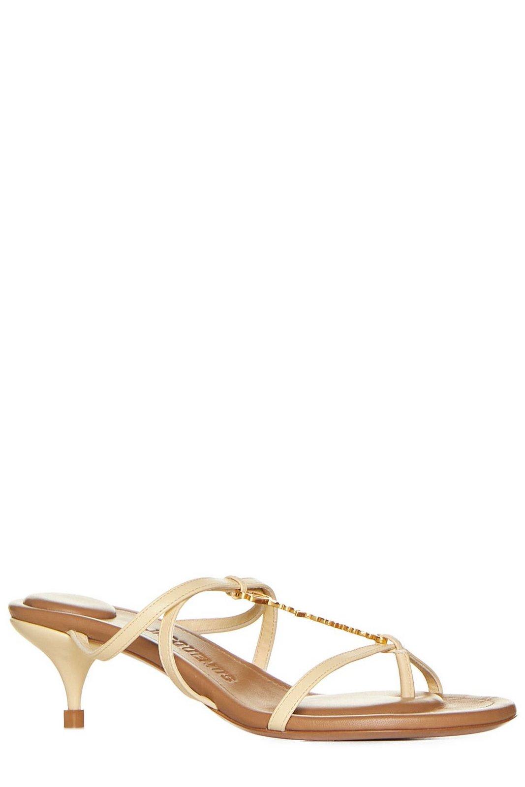 Shop Jacquemus Strappy Charm Mules In Ivory