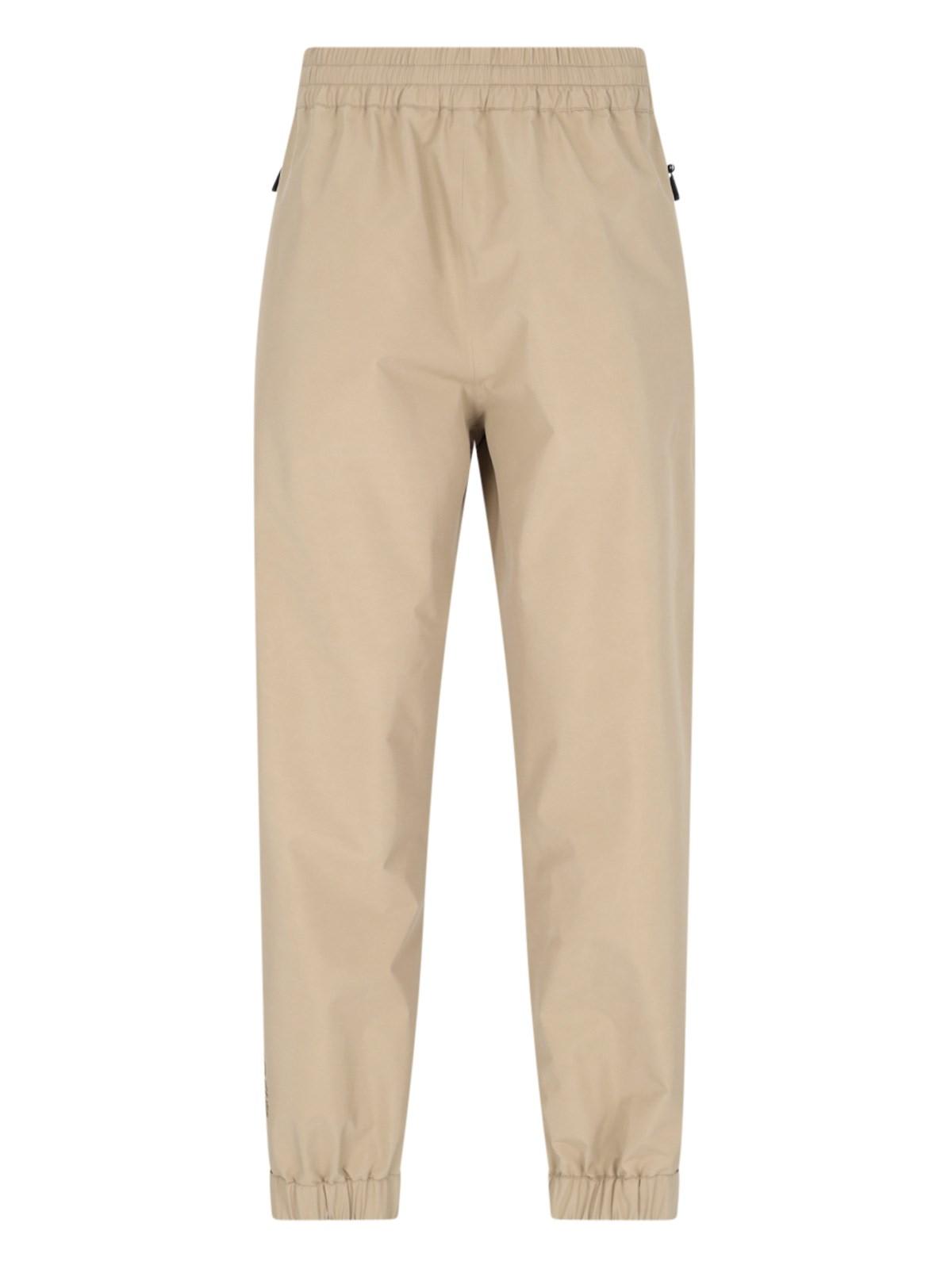 Shop Moncler Logo Track Pants In Beige