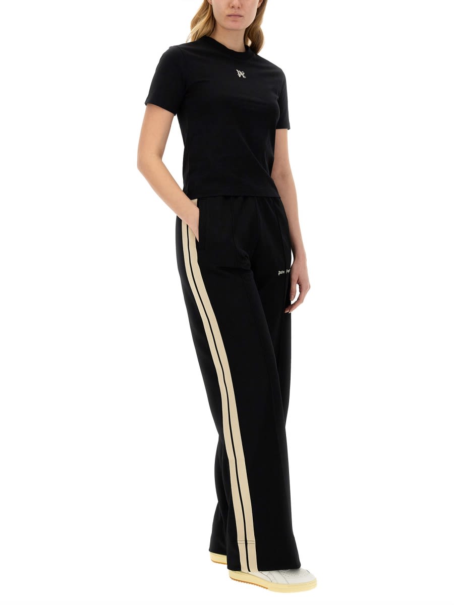 Shop Palm Angels Jogging Pants In Black