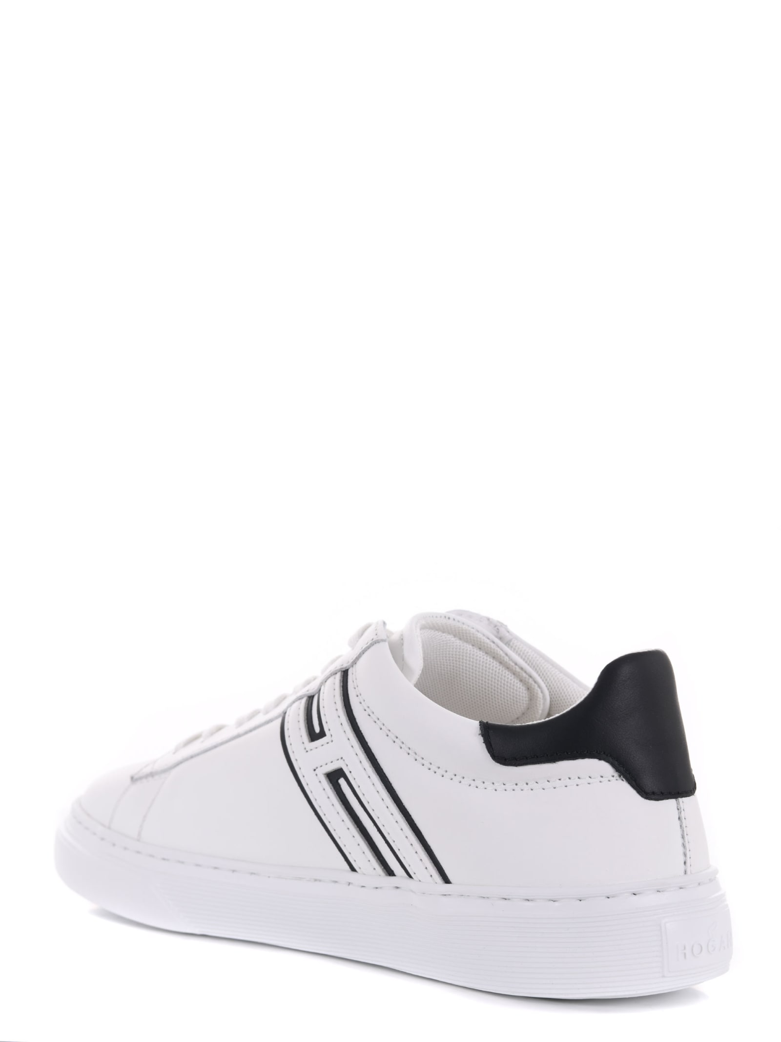 Shop Hogan Sneakers In White