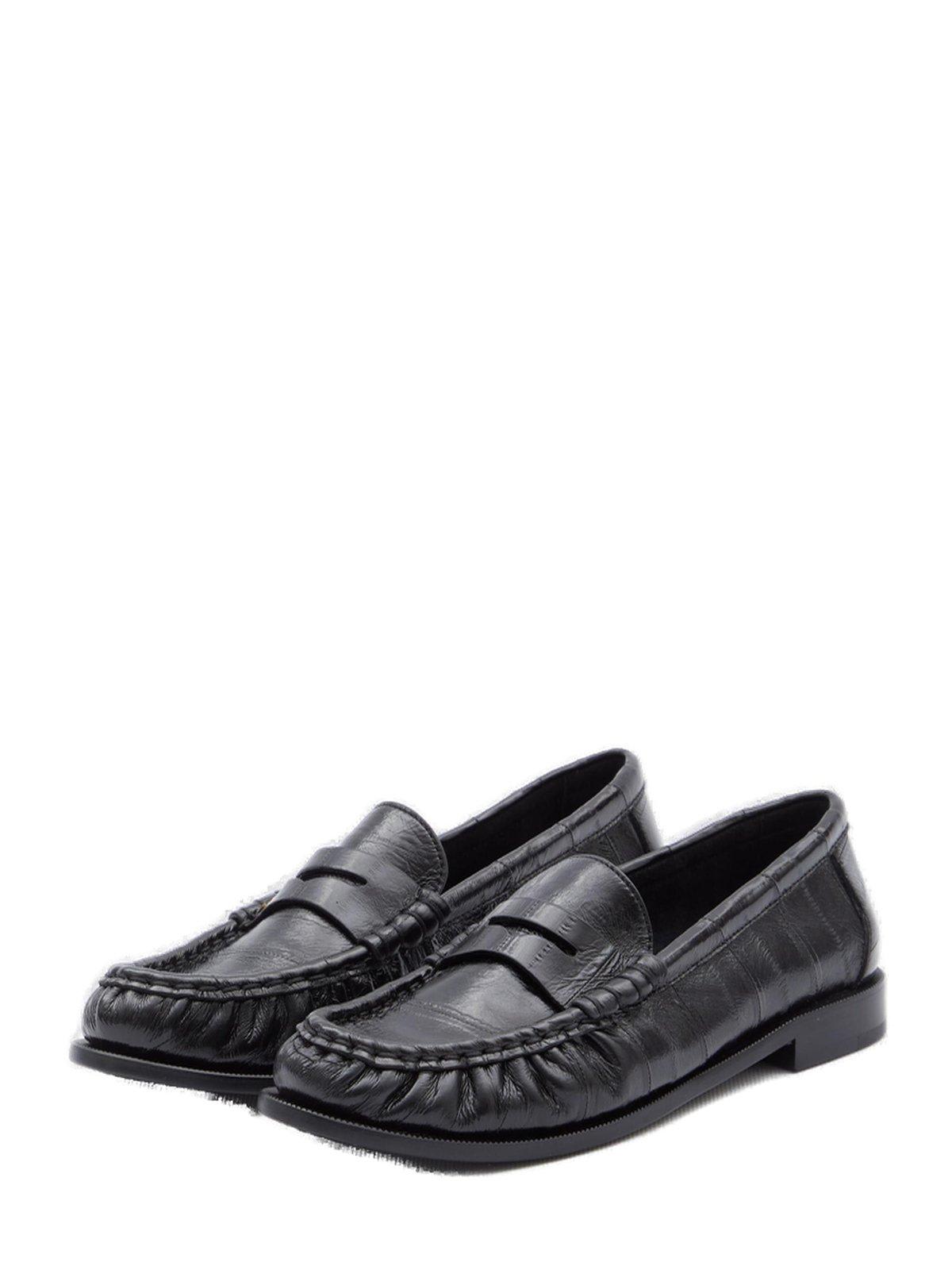 Shop Saint Laurent Logo Plaque Slip-on Loafers In Black