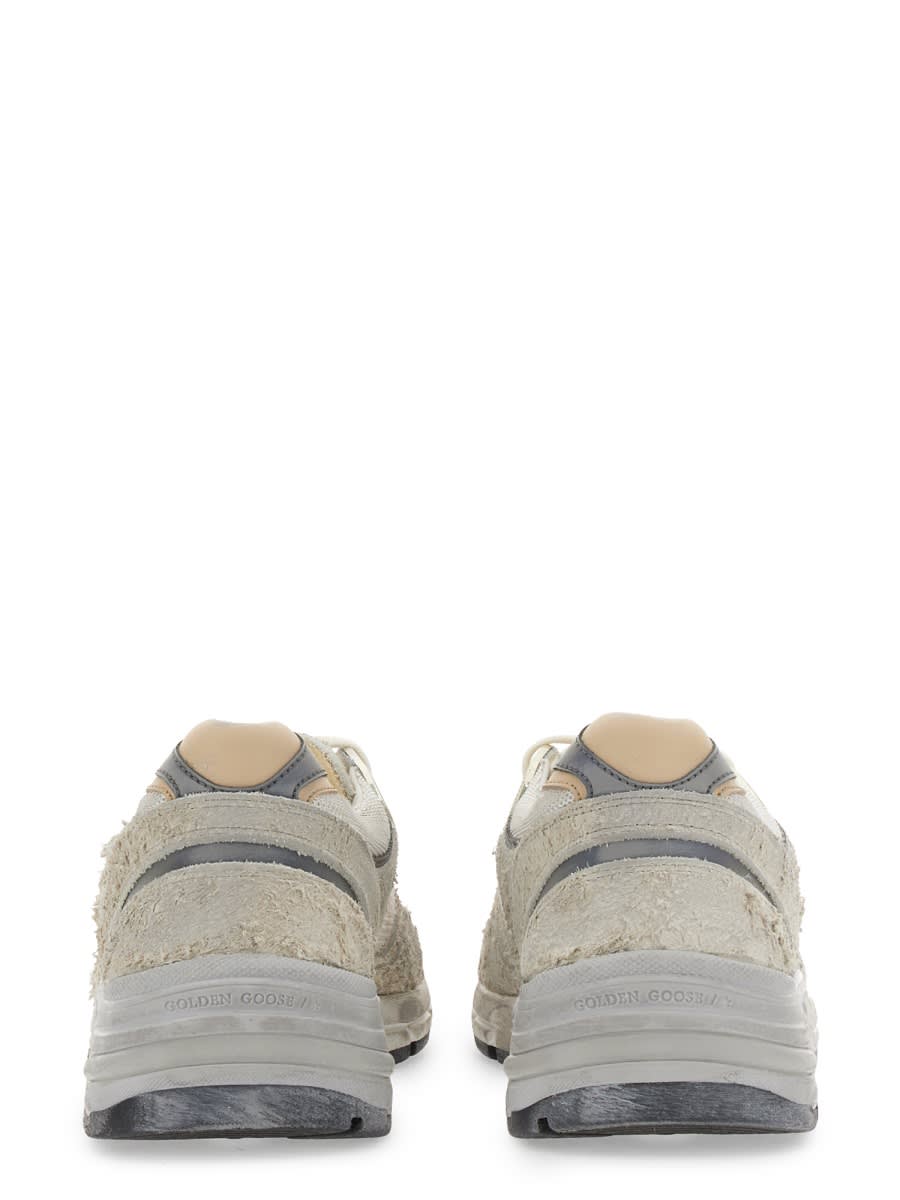 Shop Golden Goose Sneaker Running Dad In White