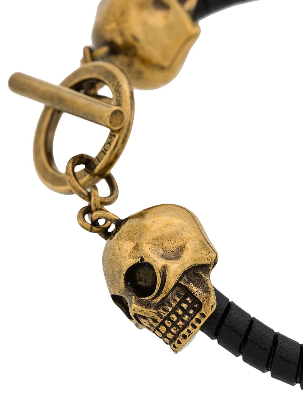 Shop Alexander Mcqueen Black And Golden Skull Bracelet With T-bar Closure