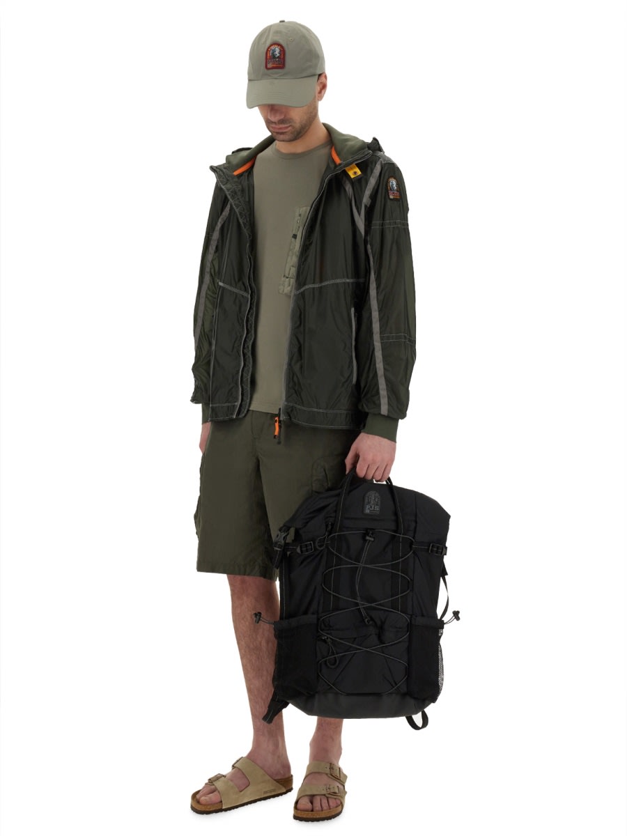 Parajumpers Edge Green Jacket With Logo Patch On The Sleeve And Shoulder Straps On The Back In Tech Fabric Man In Military Green