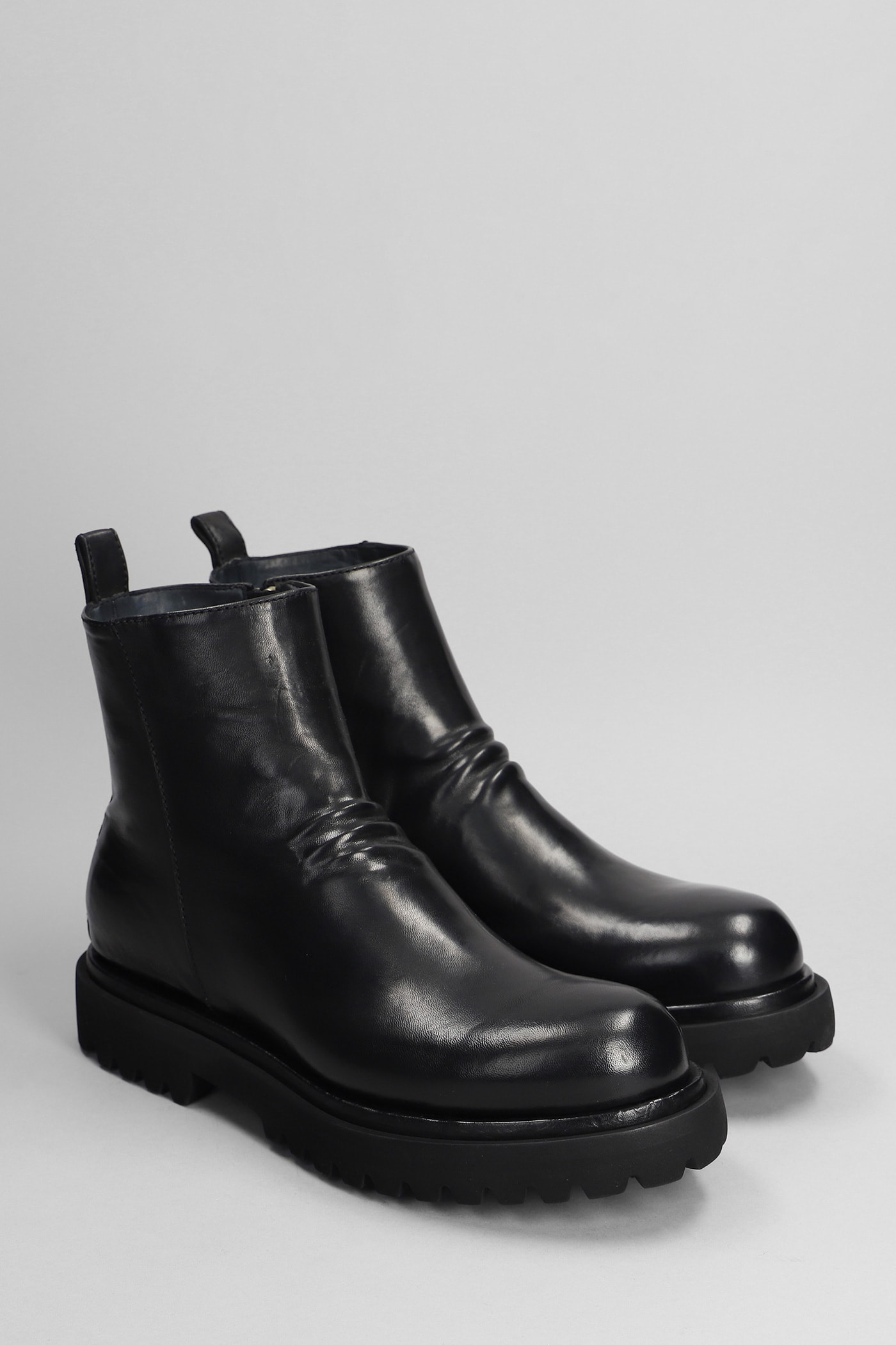 OFFICINE CREATIVE EVENTUAL DD ANKLE BOOTS IN BLACK LEATHER 