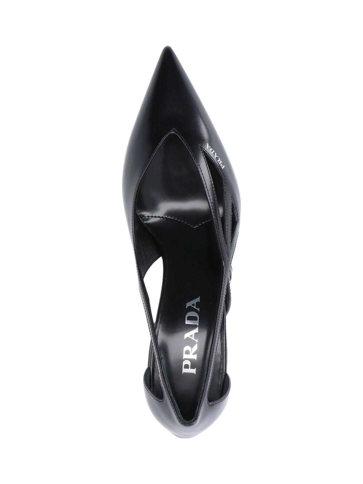 Shop Prada Cut-out Pumps In Black