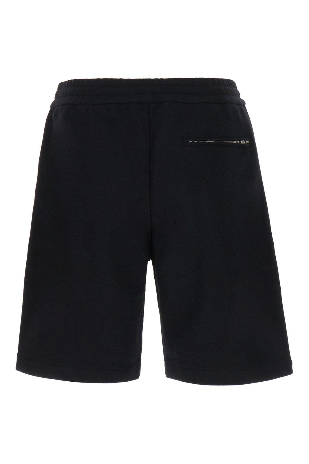 Shop Alexander Mcqueen Warped Logo Bermuda Shorts In Black