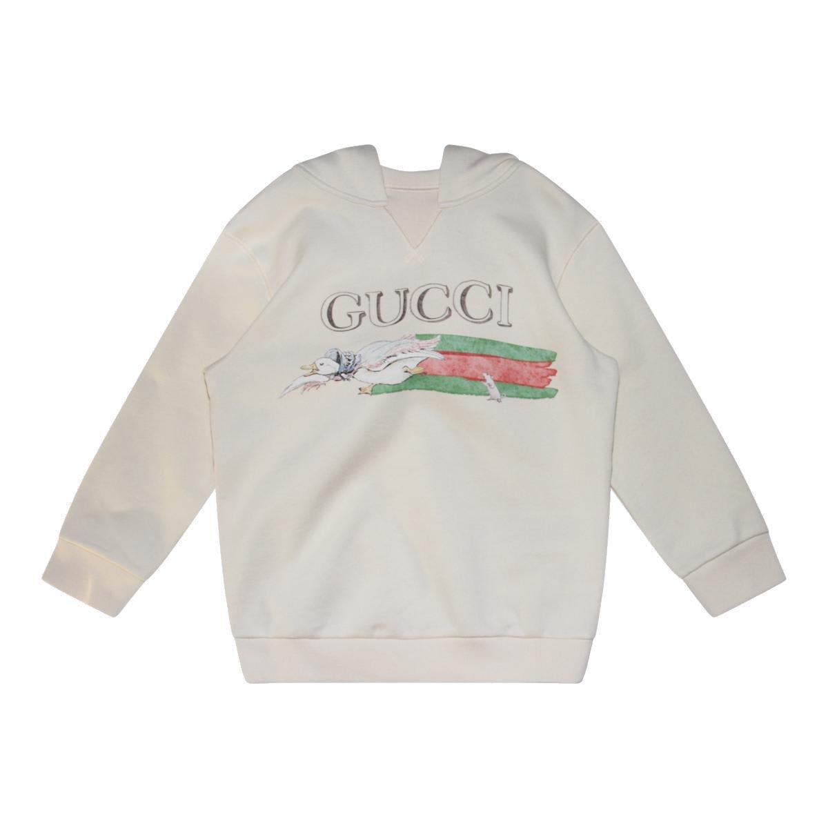 Shop Gucci Star Printed Hoodie In Beige
