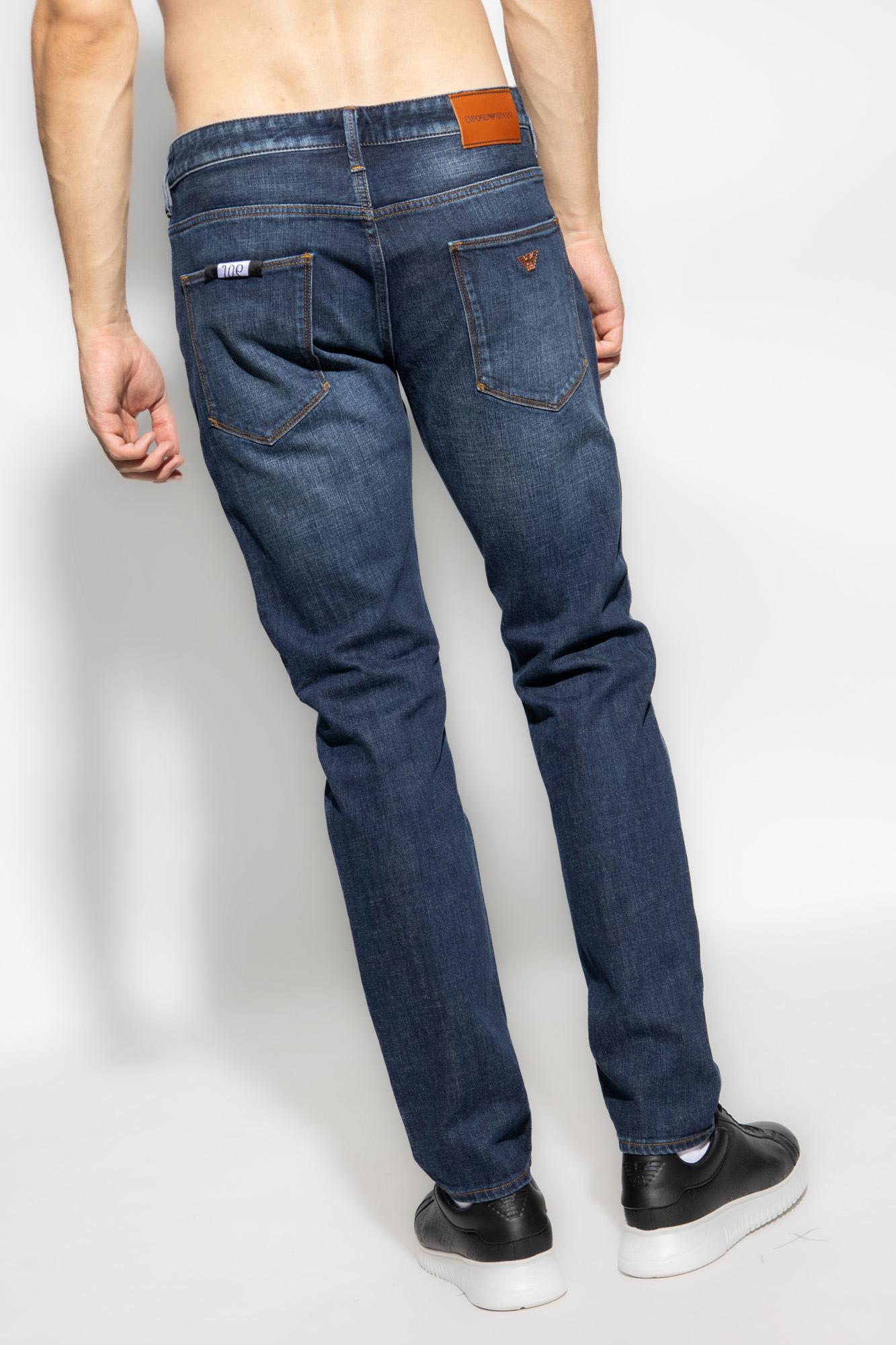 Shop Emporio Armani J06 Slim Fit Jeans In Denim Blu