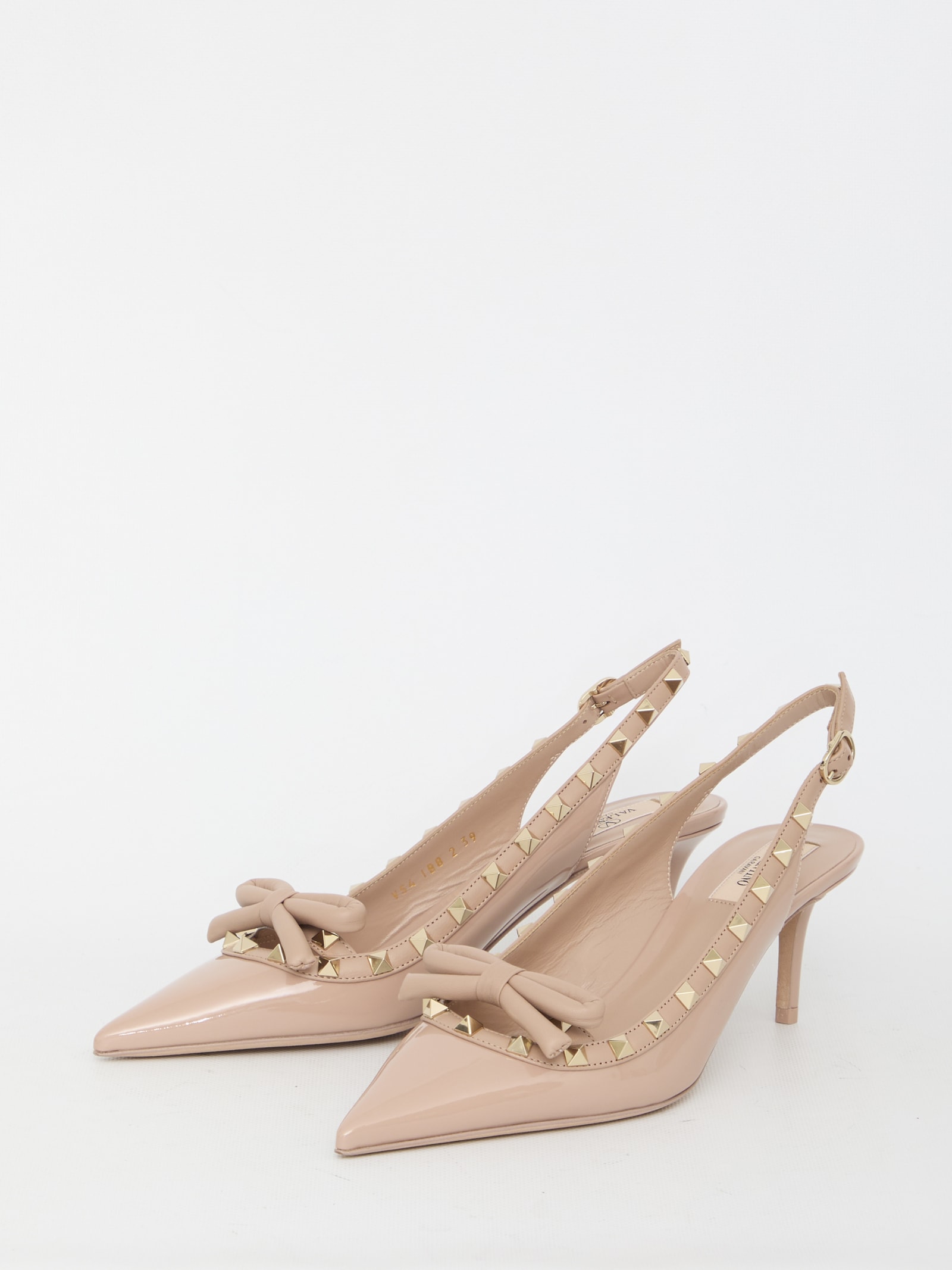 Shop Valentino Rockstud Bow Slingback Pumps In Pink