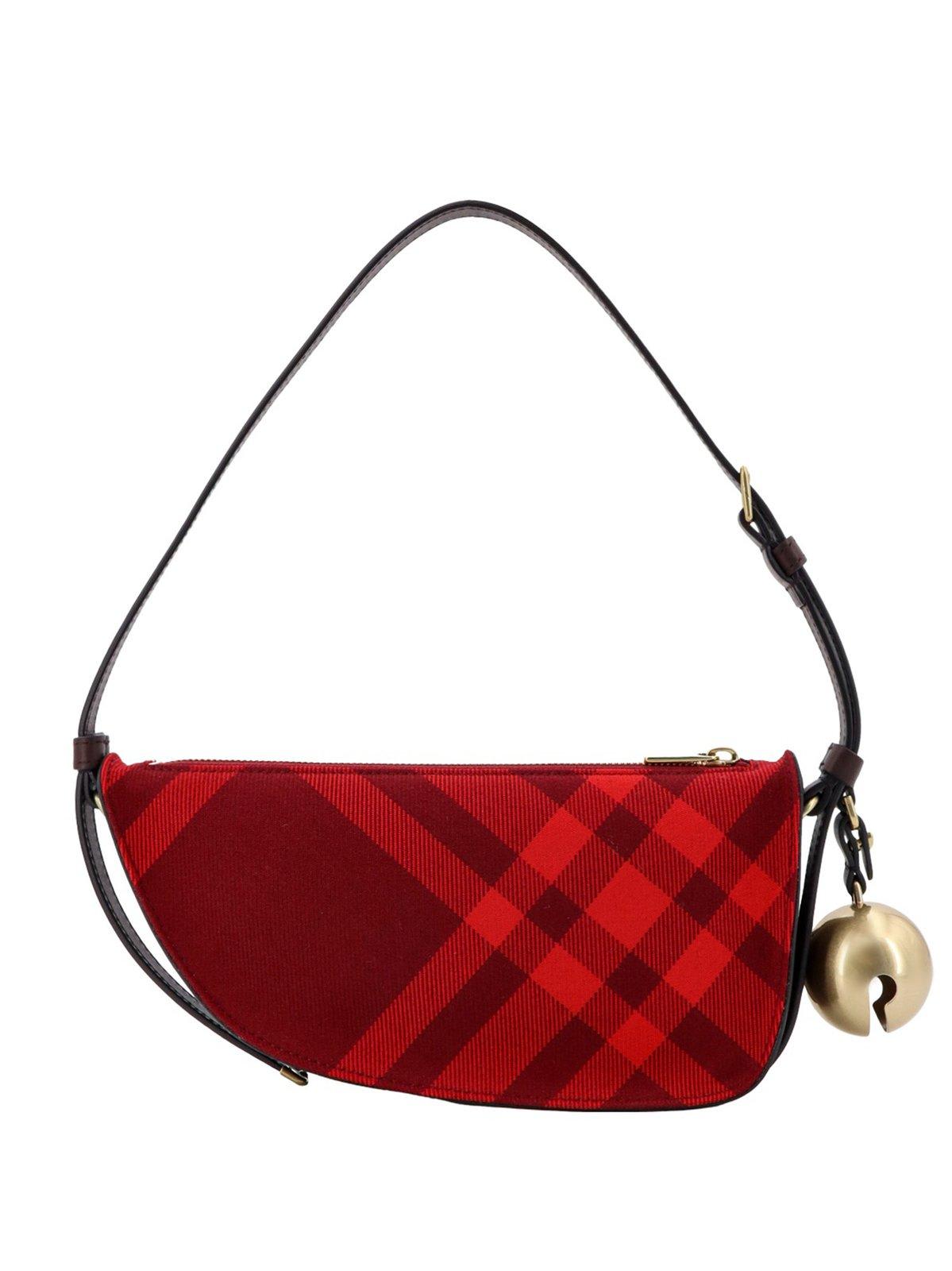 Shop Burberry Mini Shield Check-pattern Bell-charm Shoulder Bag In Red