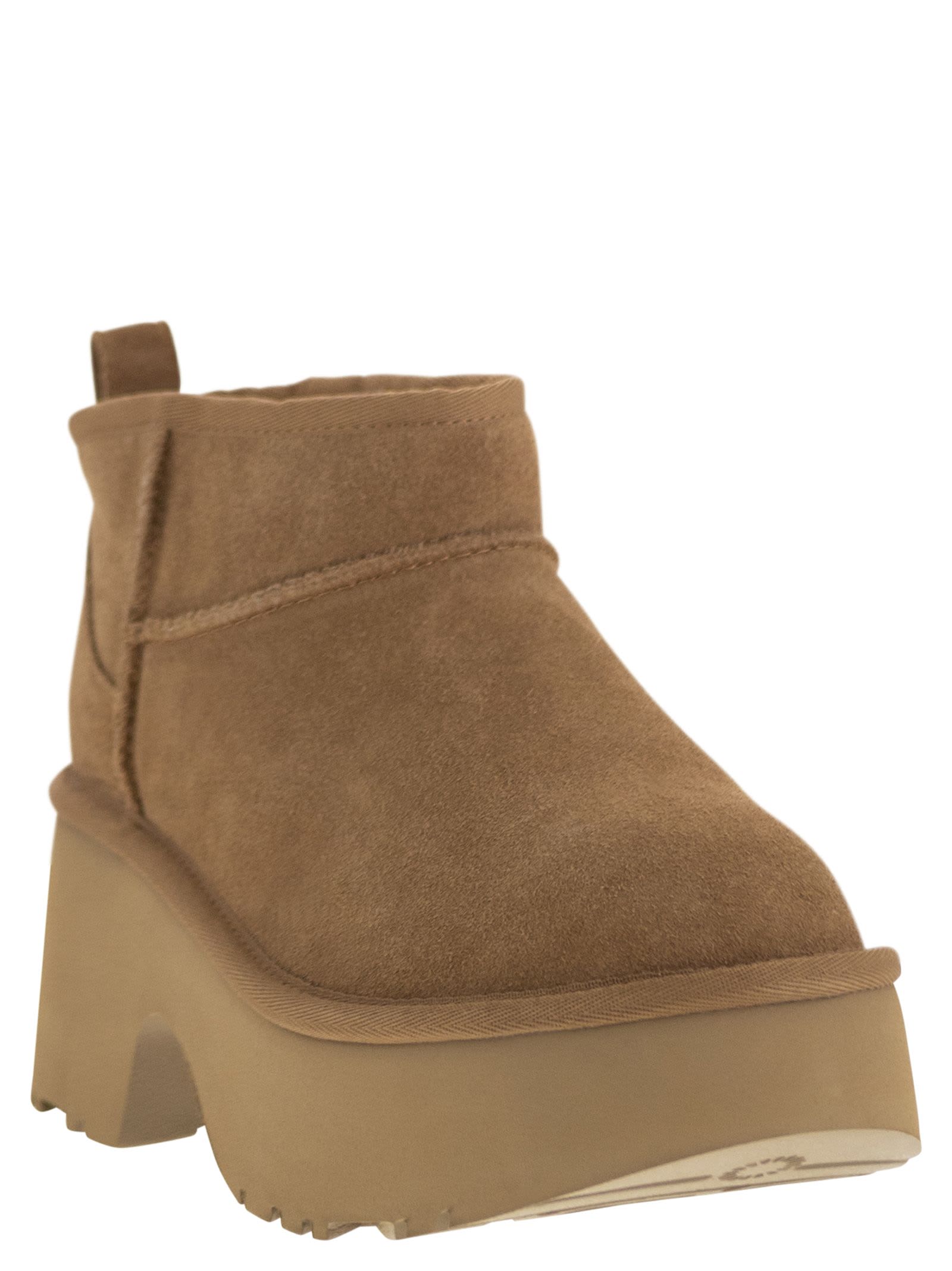 Ugg Chunky Sole Ankle Boots With Luxurious Sheepskin And Elevated Design In Brown