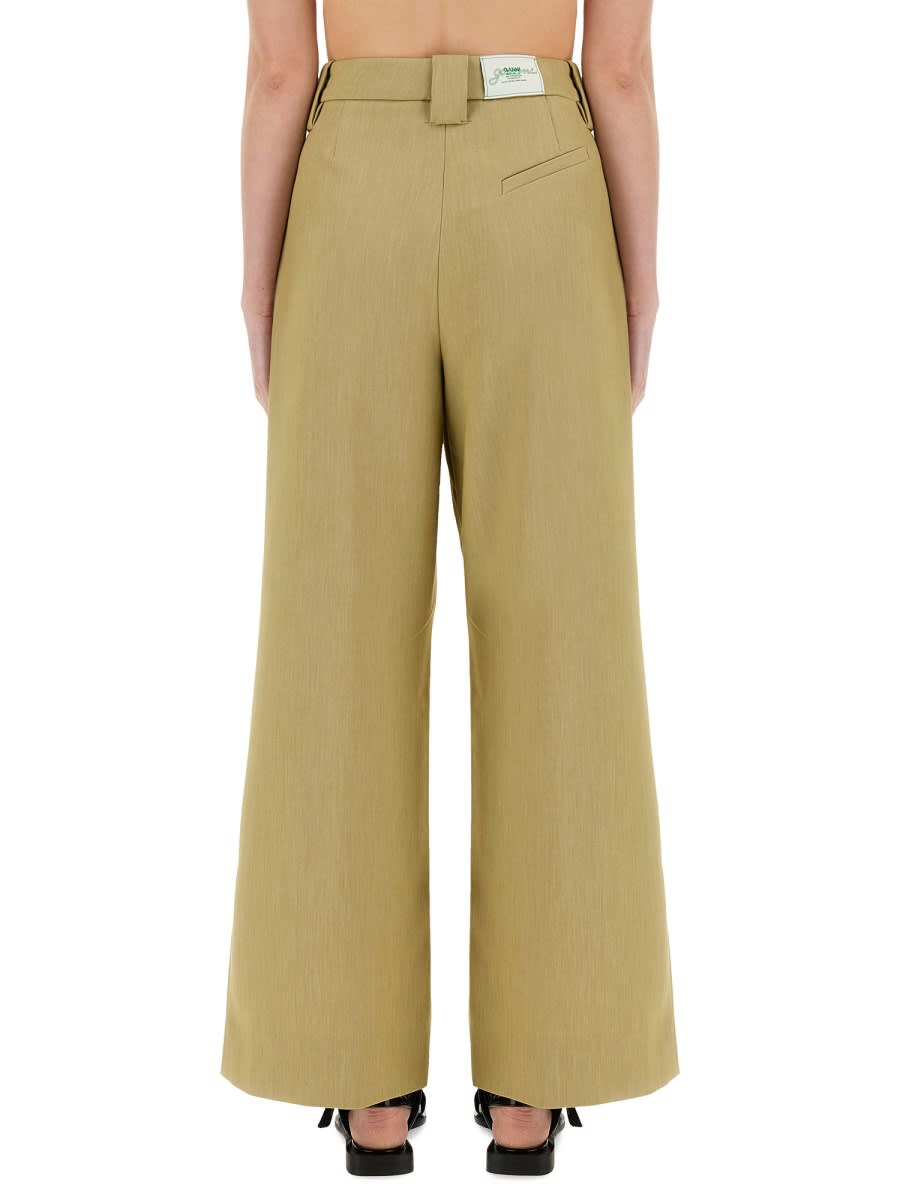 Ganni Mid-rise Pleated Wide-leg Pants In Beige
