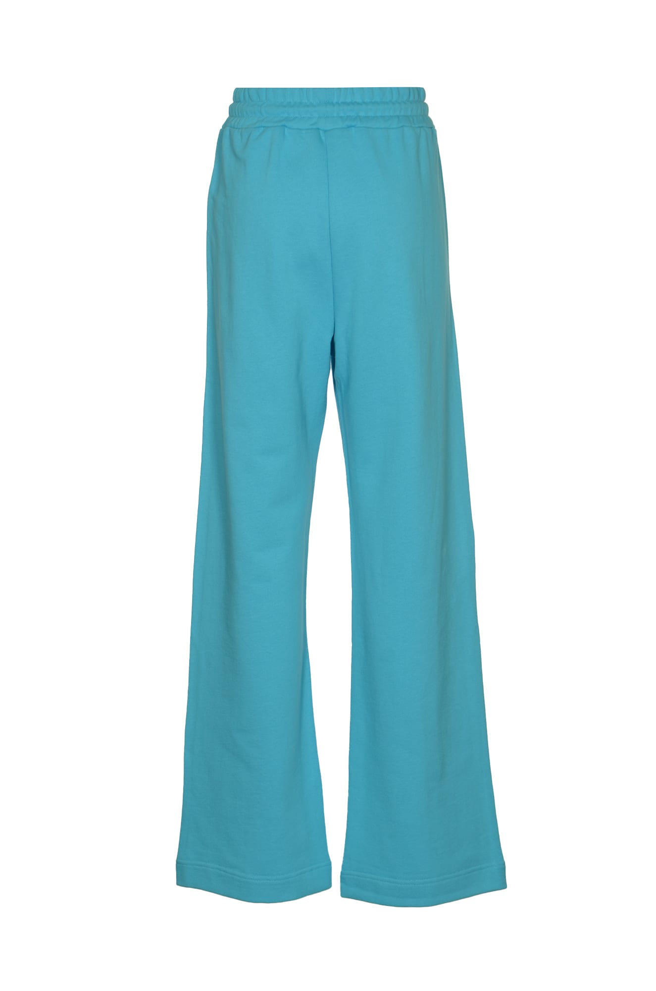 Shop Msgm Flared Leg Logo Track Pants In Light Blue