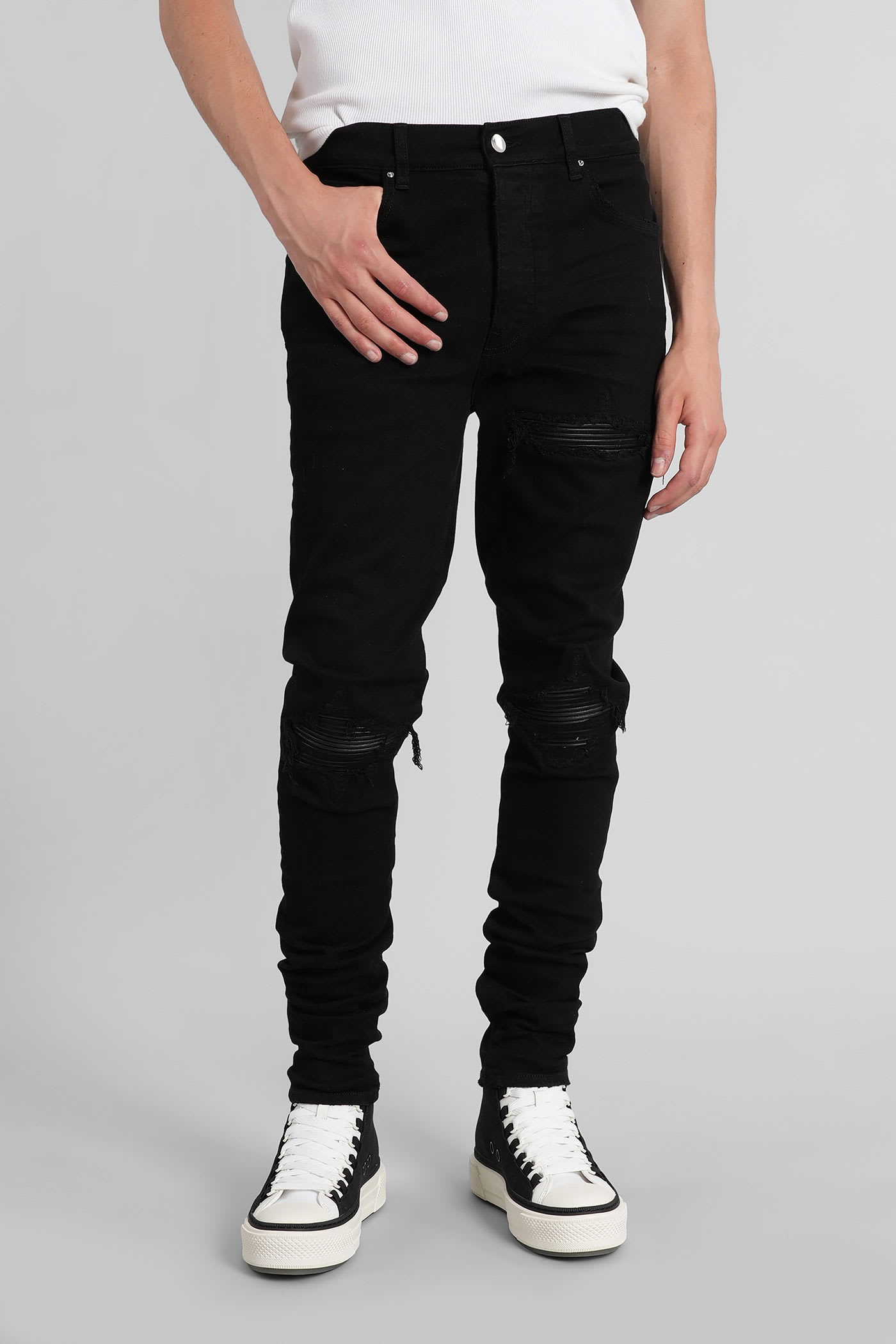 Amiri Slim Fit Distressed Five-pocket Trousers In Black