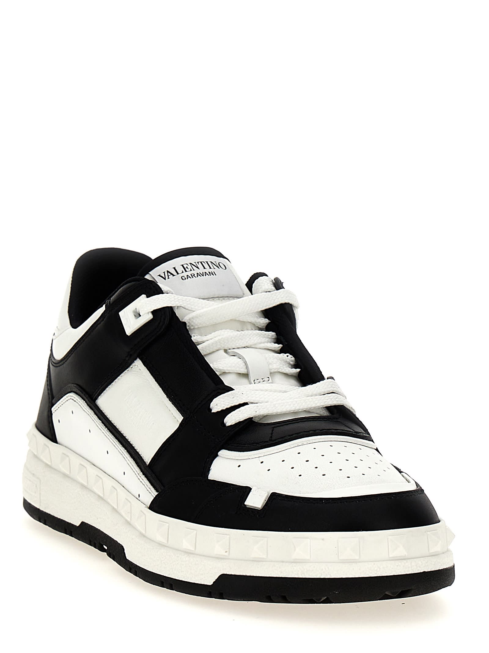 Shop Valentino Garavani Freedots Sneakers In White/black