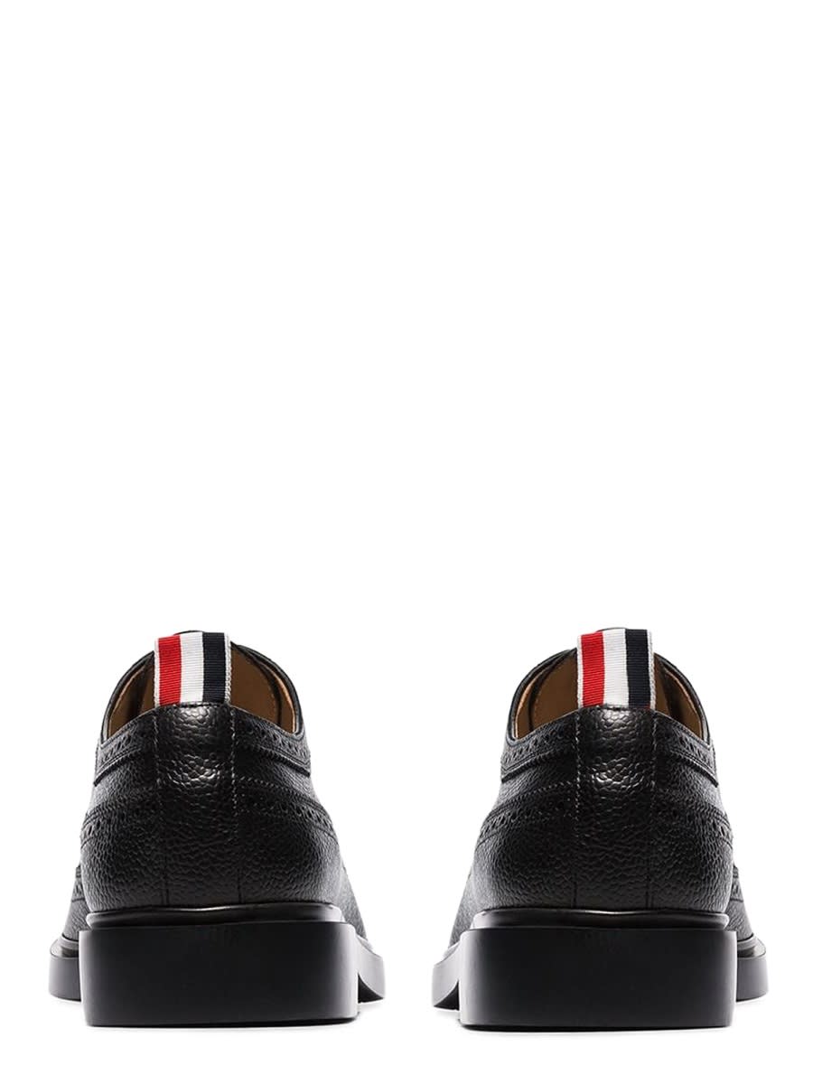 Shop Thom Browne Lace-up Longwing Brogue In Black