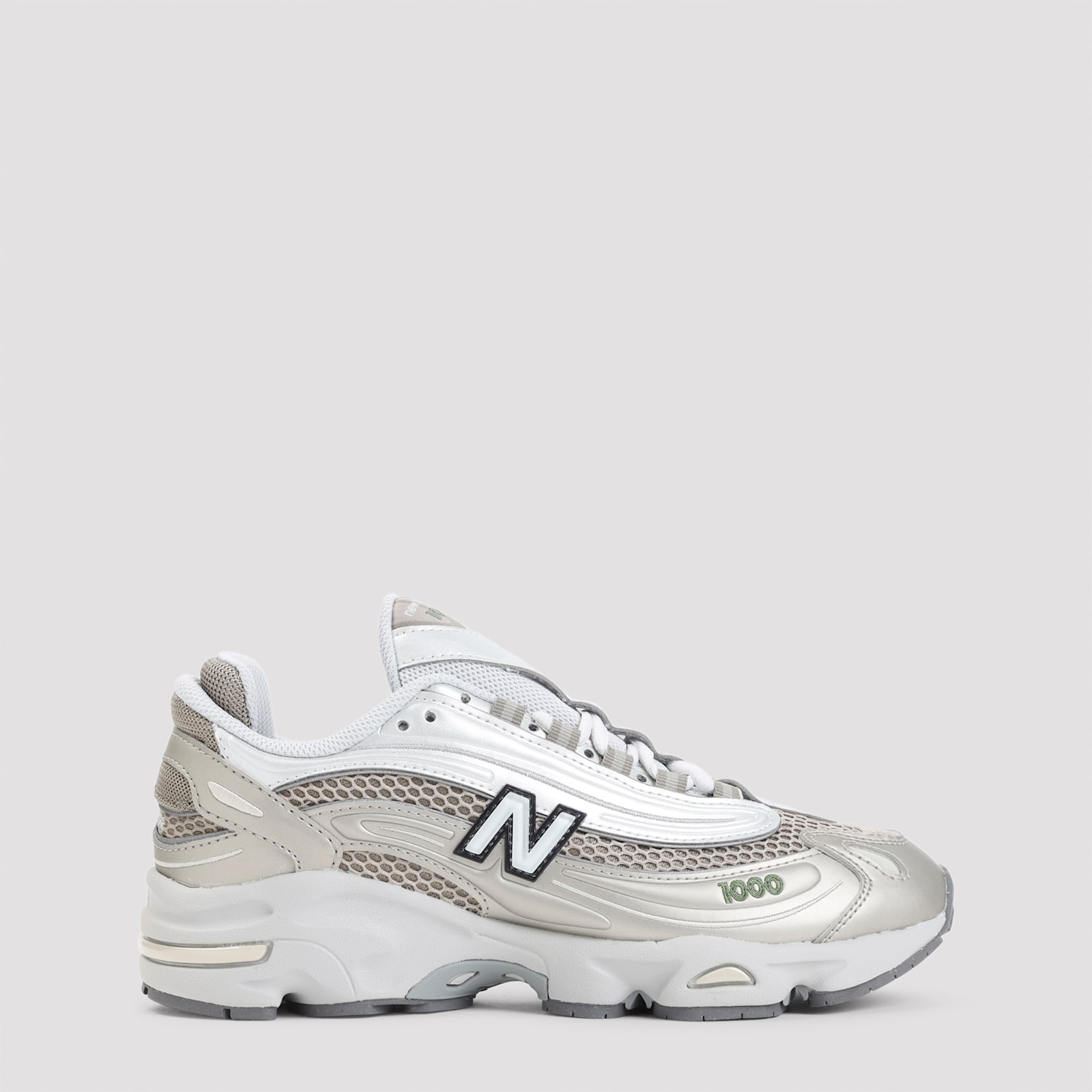 New Balance Contemporary Sneakers Featuring Mesh Panels And Reflective Accents In White