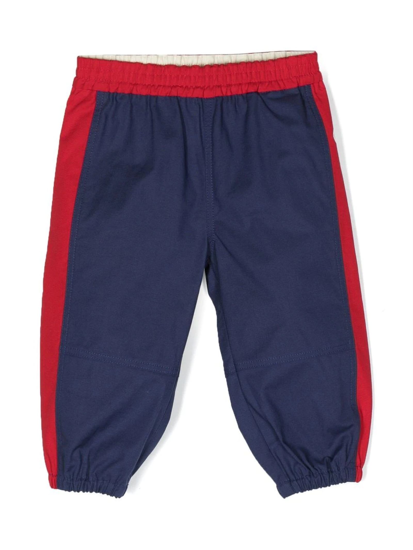GUCCI RED AND BLUE TRACK PANTS