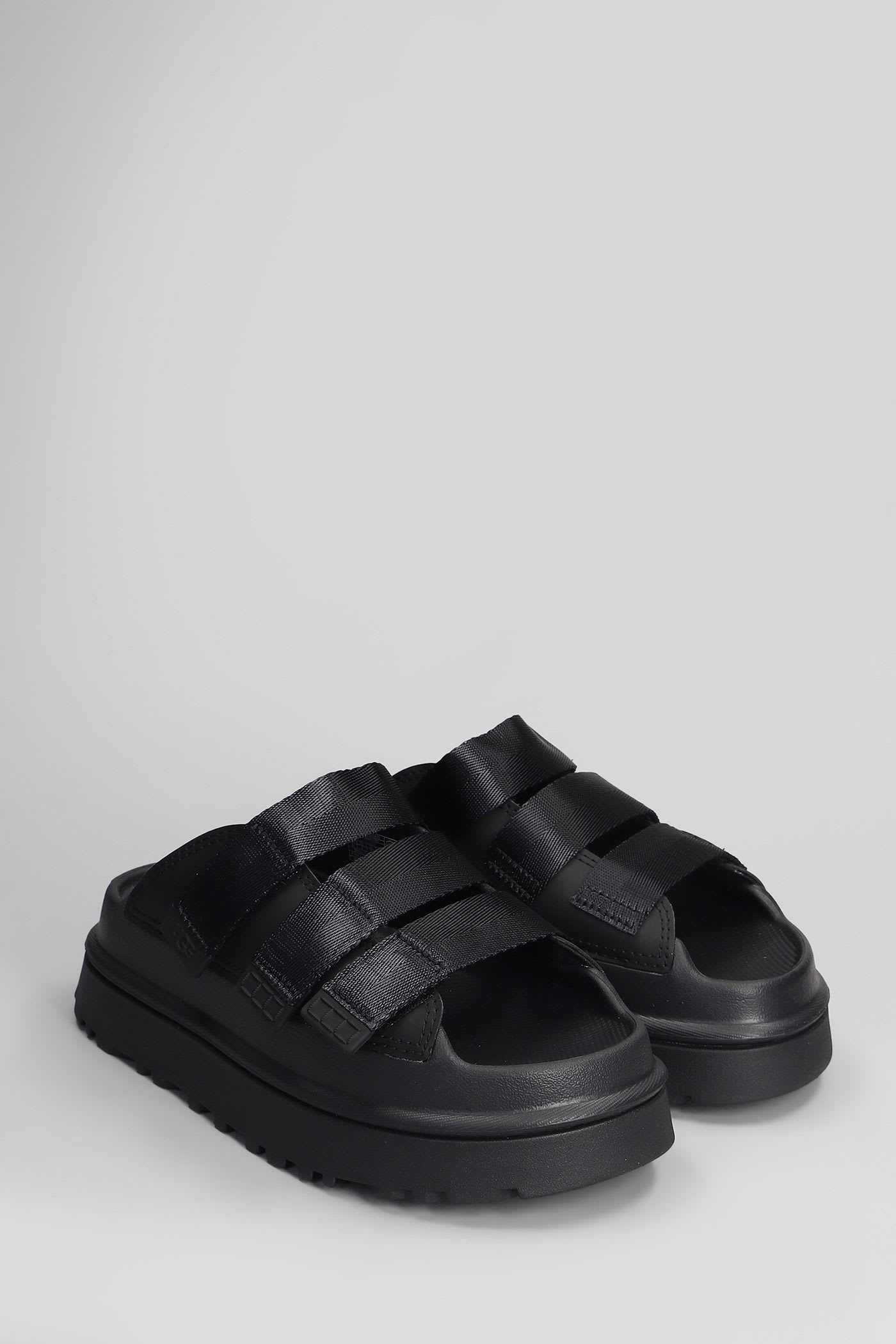 UGG GOLDENGLOW SLIPPER-MULE IN BLACK RUBBER/PLASIC