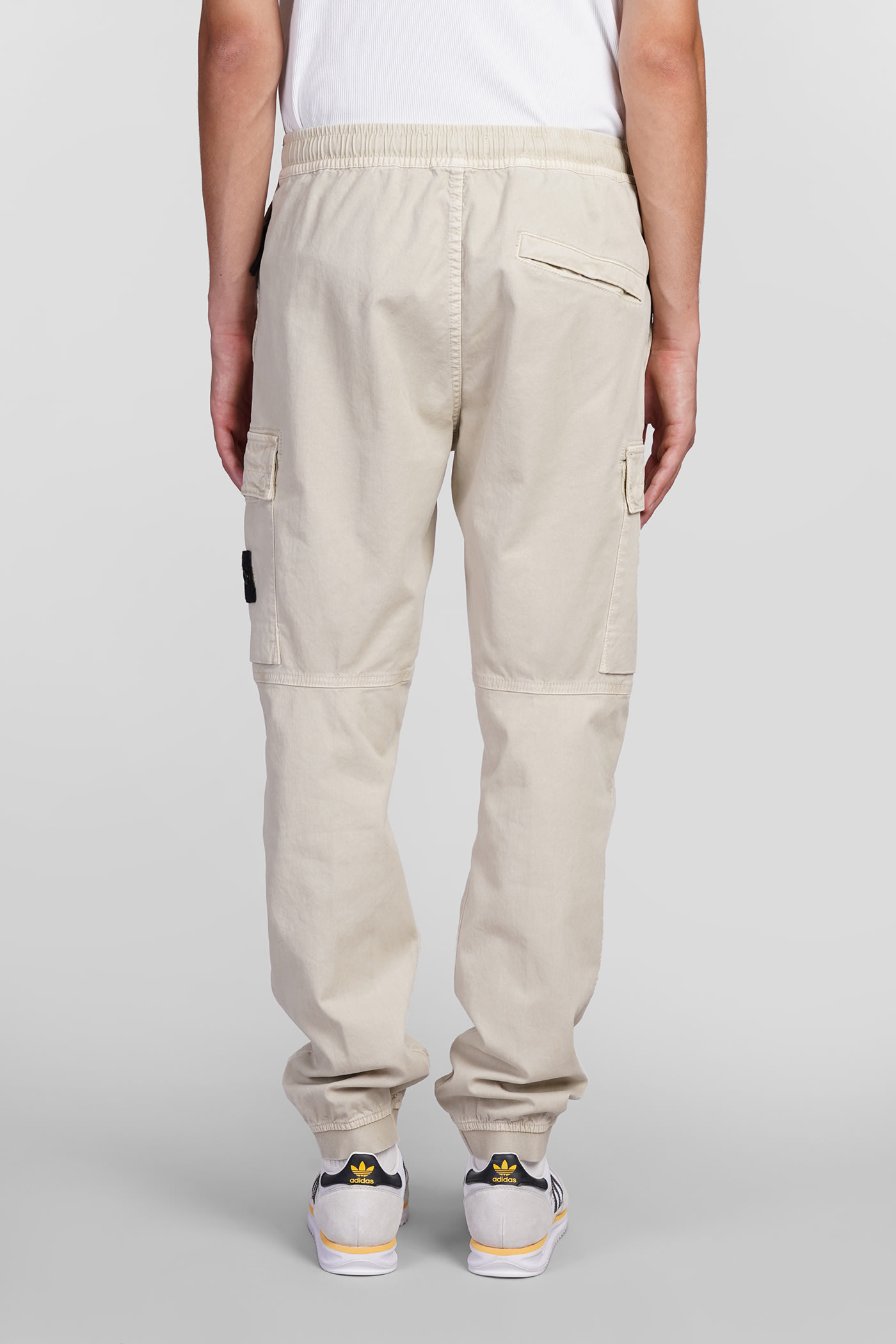 Shop Stone Island Pants In Beige Cotton