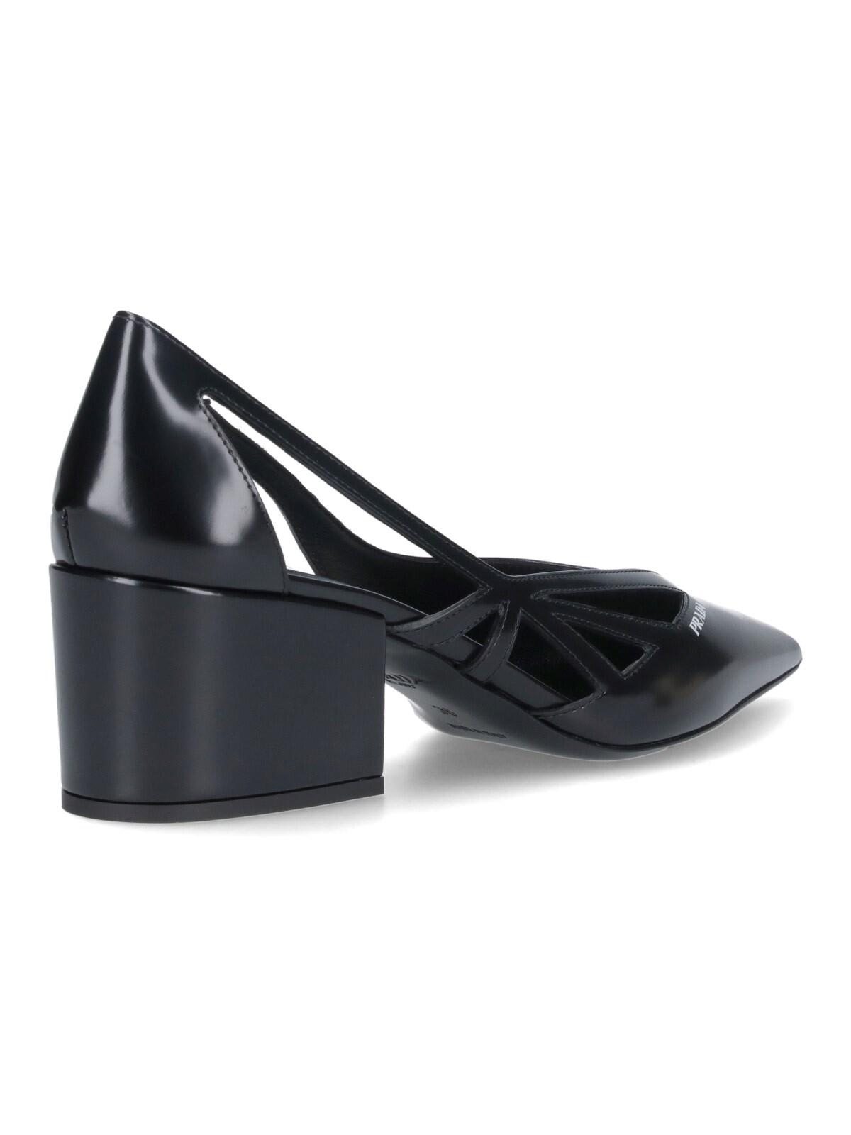 Shop Prada Cut-out Pumps In Black